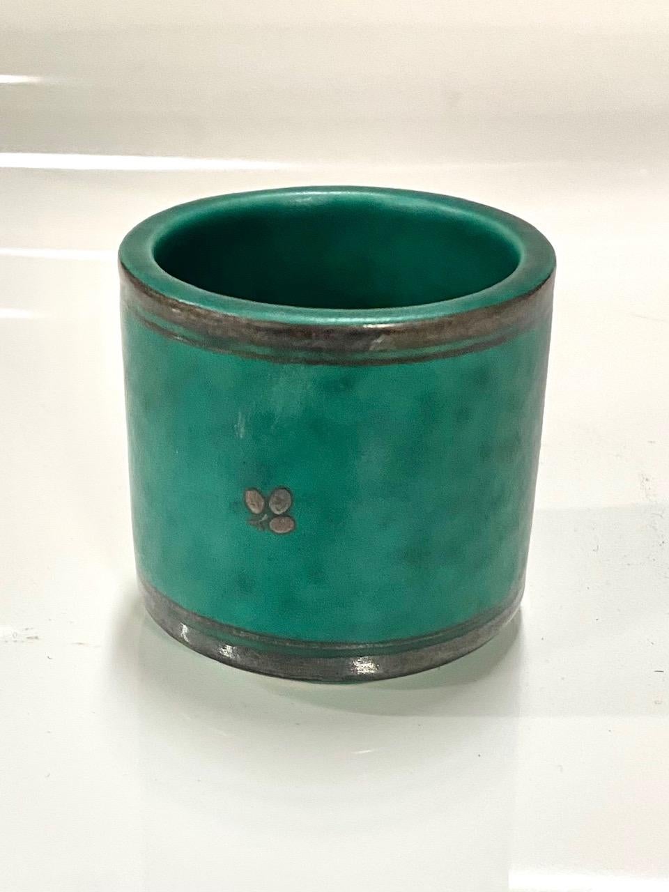 Green glazed ceramic and silver 