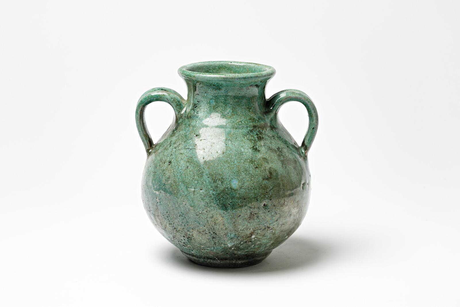 French Green glazed ceramic handle pot by Gisèle Buthod Garçon, circa 1980-1990 For Sale