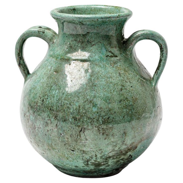 Green glazed ceramic handle pot by Gisèle Buthod Garçon, circa 1980-1990 For Sale