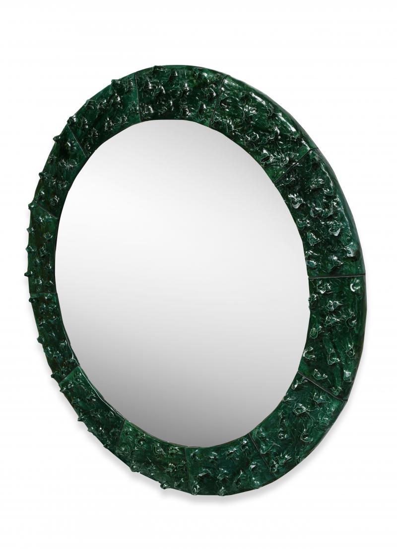 Green Glazed Ceramic Mirror by Ana-Belen Castillo, 2021

The frame of this mirror features beautiful texture and variation in the glossy green glaze. Hand-made in segments that add a geometric element to the design.
