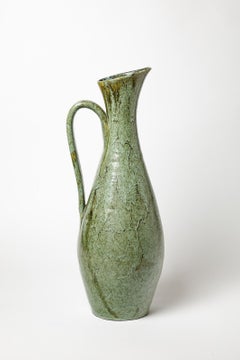 Green glazed ceramic pitcher by Accolay, circa 1960-1970.