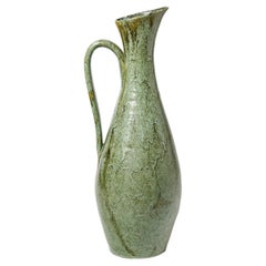 Green glazed ceramic pitcher by Accolay, circa 1960-1970.