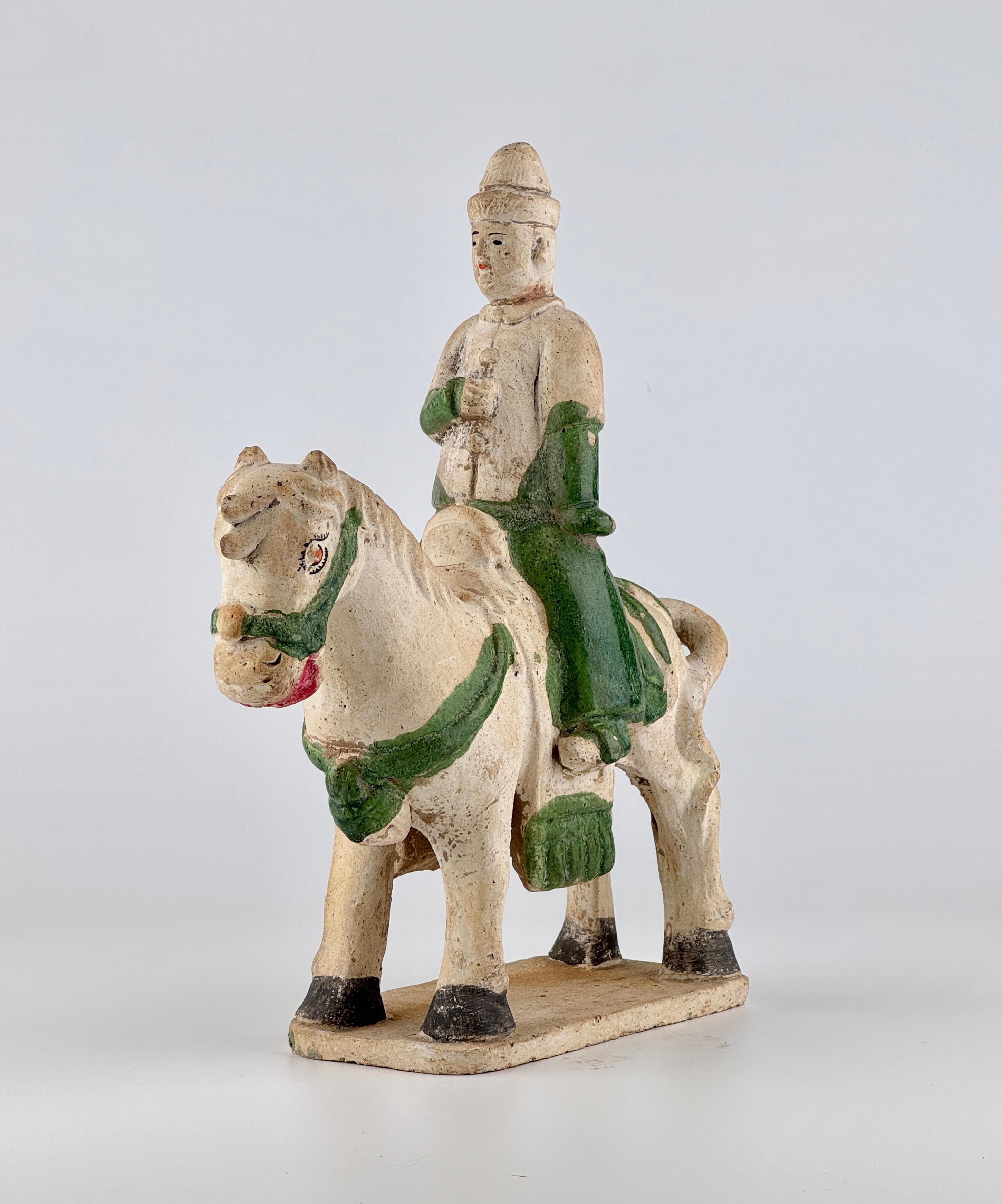 Statues of East Asian horse rider, featuring glazes in green, are set on rectangular base.

Period: Ming Dynasty 
Medium: Green-glazed Pottery
Type: Figure
Condition : Good
Provenance : Acquired in early 2000s from Hongkong

 

* Ming Dynasty Glazed