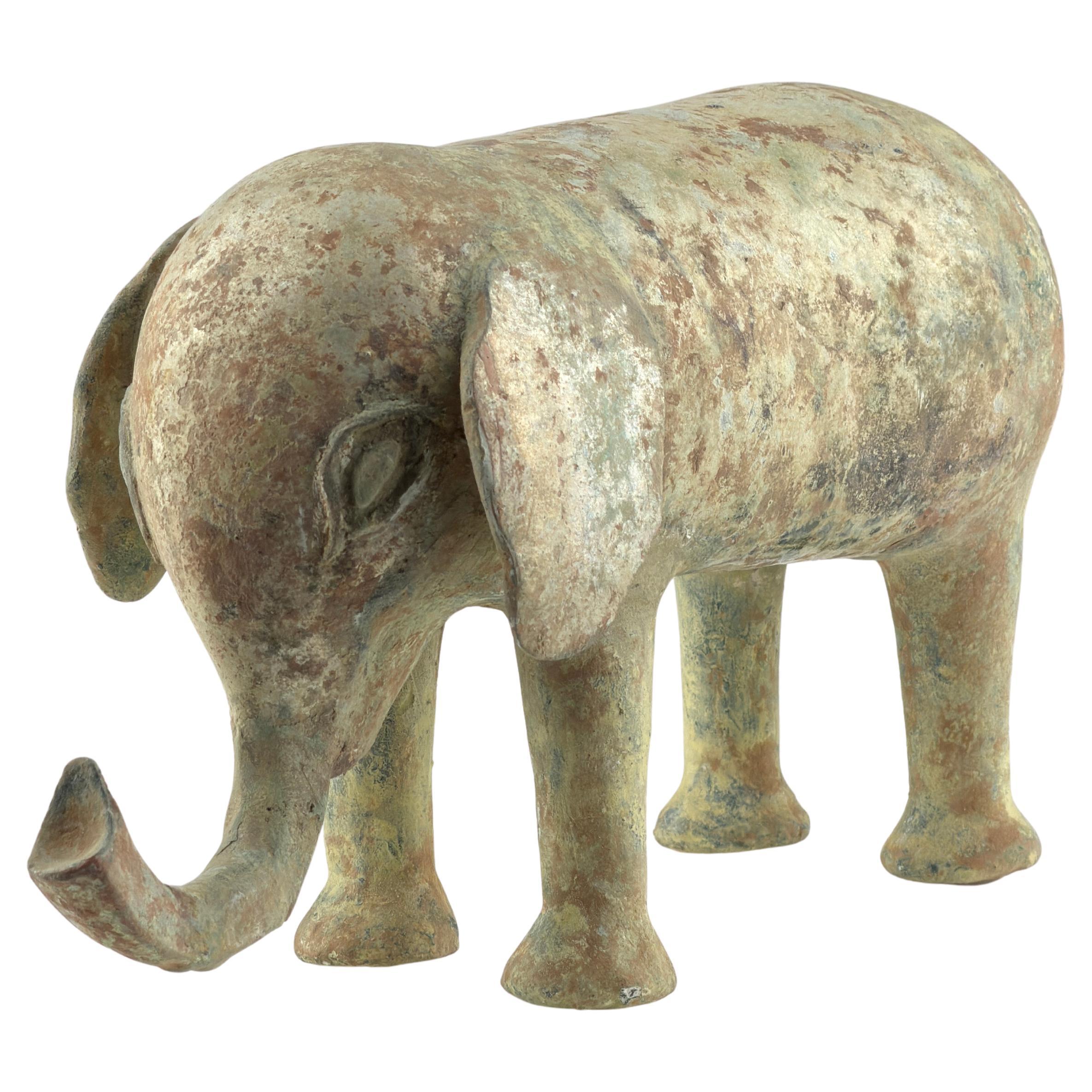 Éléphant en poterie à glaçure verte, dynastie Han
