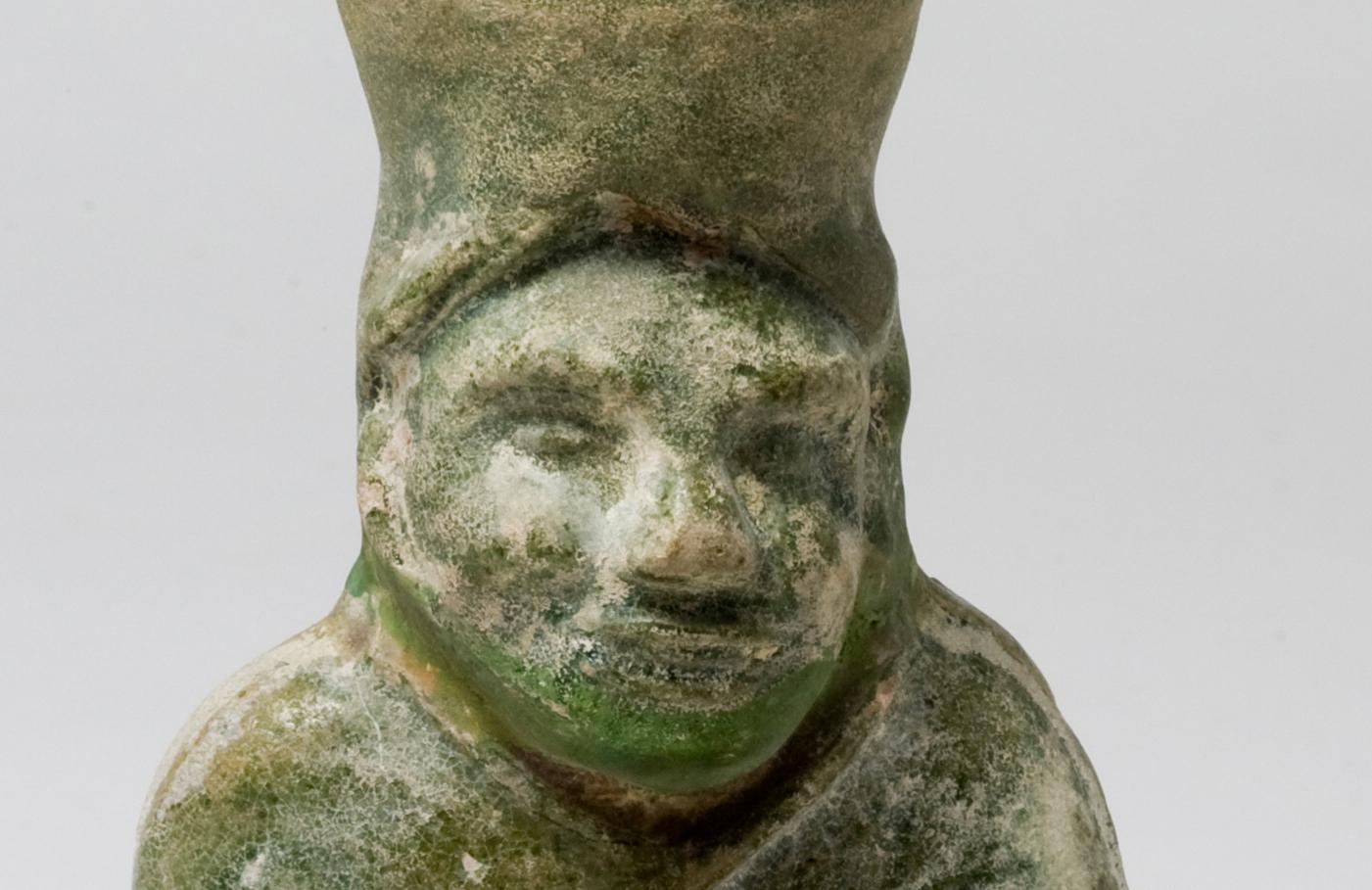 Glazed Green-glazed pottery 'figural' lamp, Han Dynasty For Sale