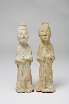 Two Green glazed Figures Holding Pitchpork