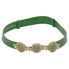Cintura in pelle e cabochon verde e oro Judith Leiber