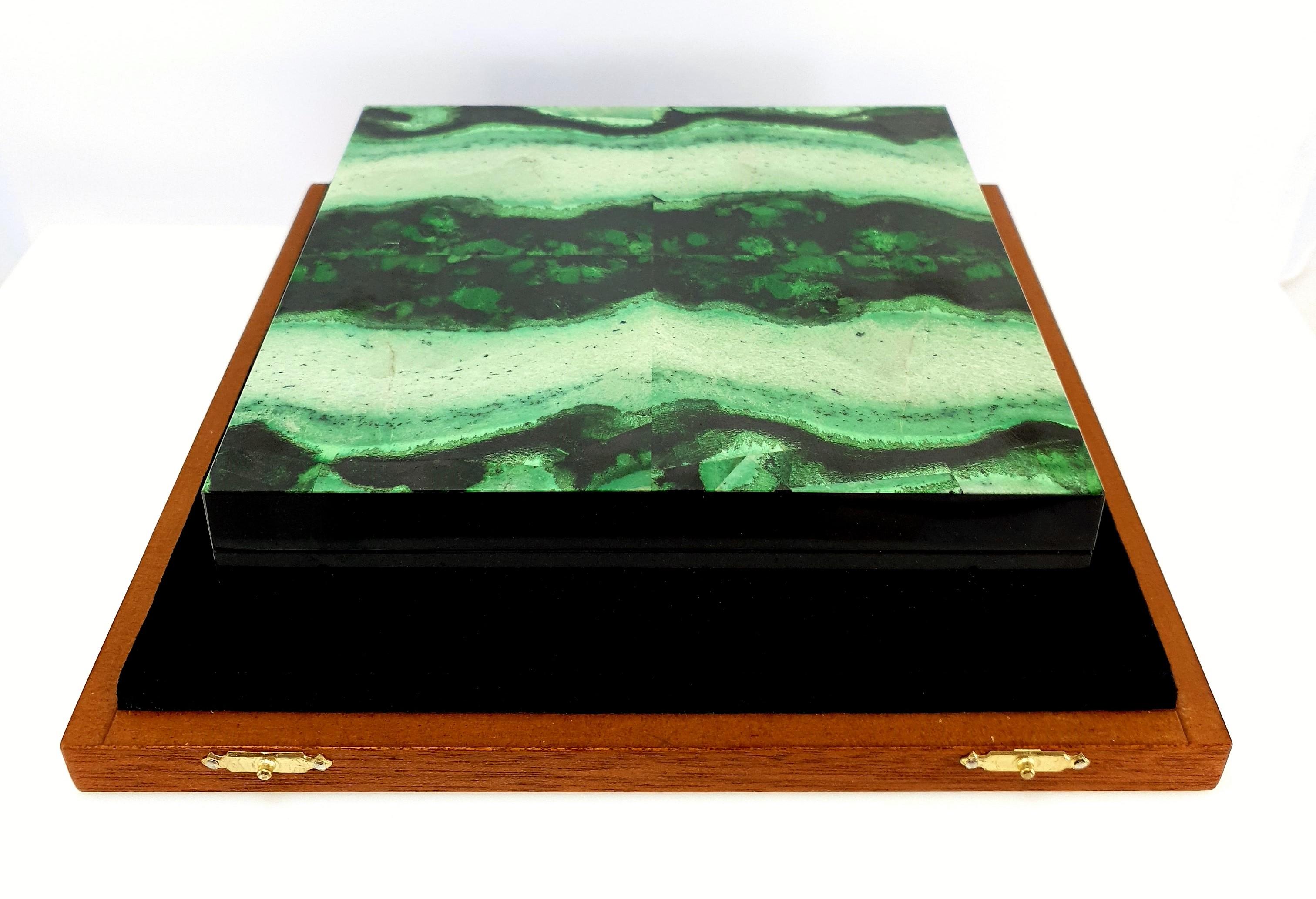 A Natural Handmade Green Garnet Grossular and Black Marble Decorative Jewelry Box.
The pattern looks like an artful painting of nature.

The Inlay is clad with cedar wood and is ideal as a cigar box.
Green Grossular belong to the Garnet family and