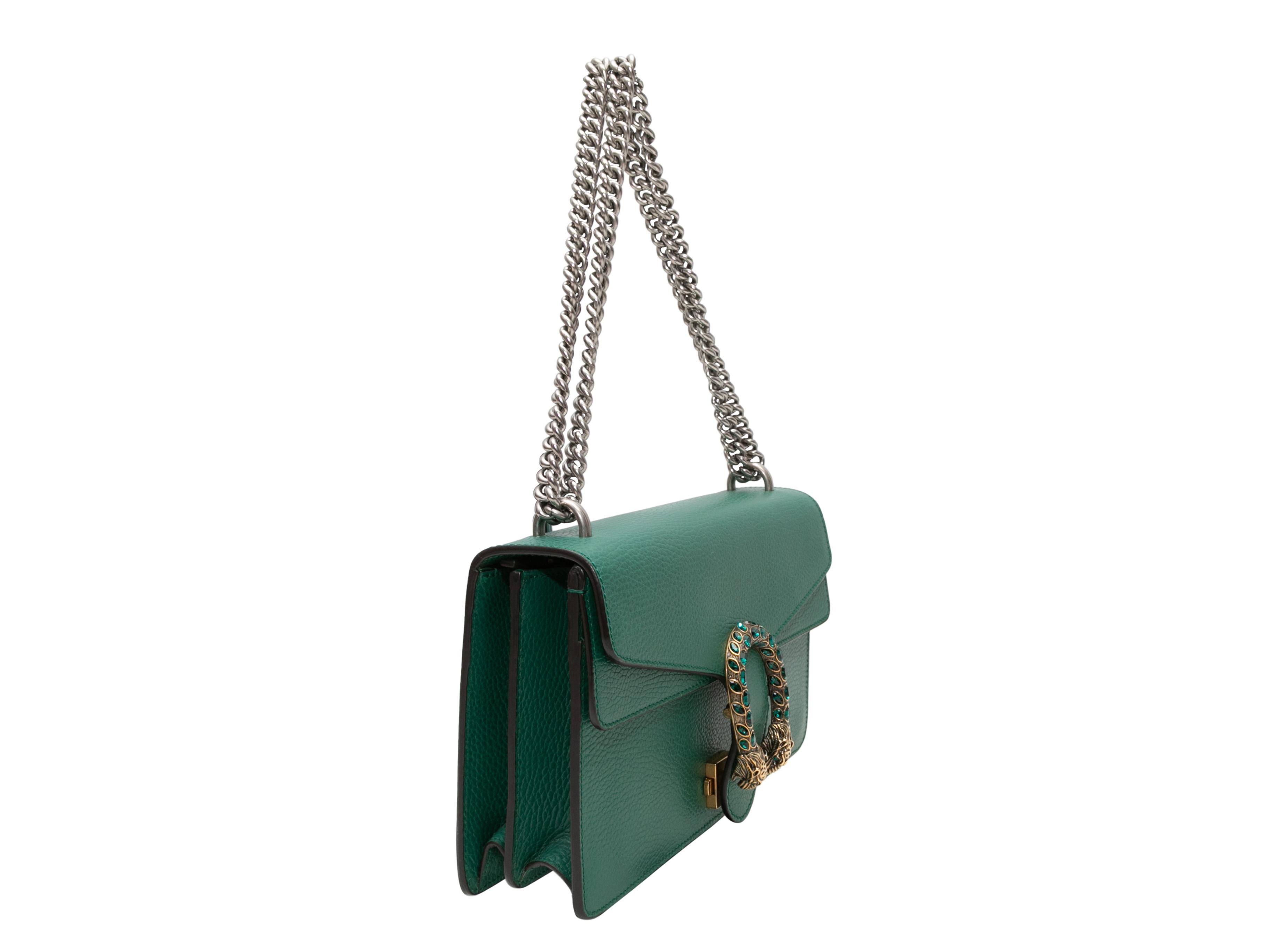 Product Details: Green Gucci Medium Dionysus Shoulder Bag. The Medium Dionysus bag features a pebbled leather body, gold-tone and silver-tone hardware, a chain-link shoulder strap, and a jewel-embellished front flap closure. 11