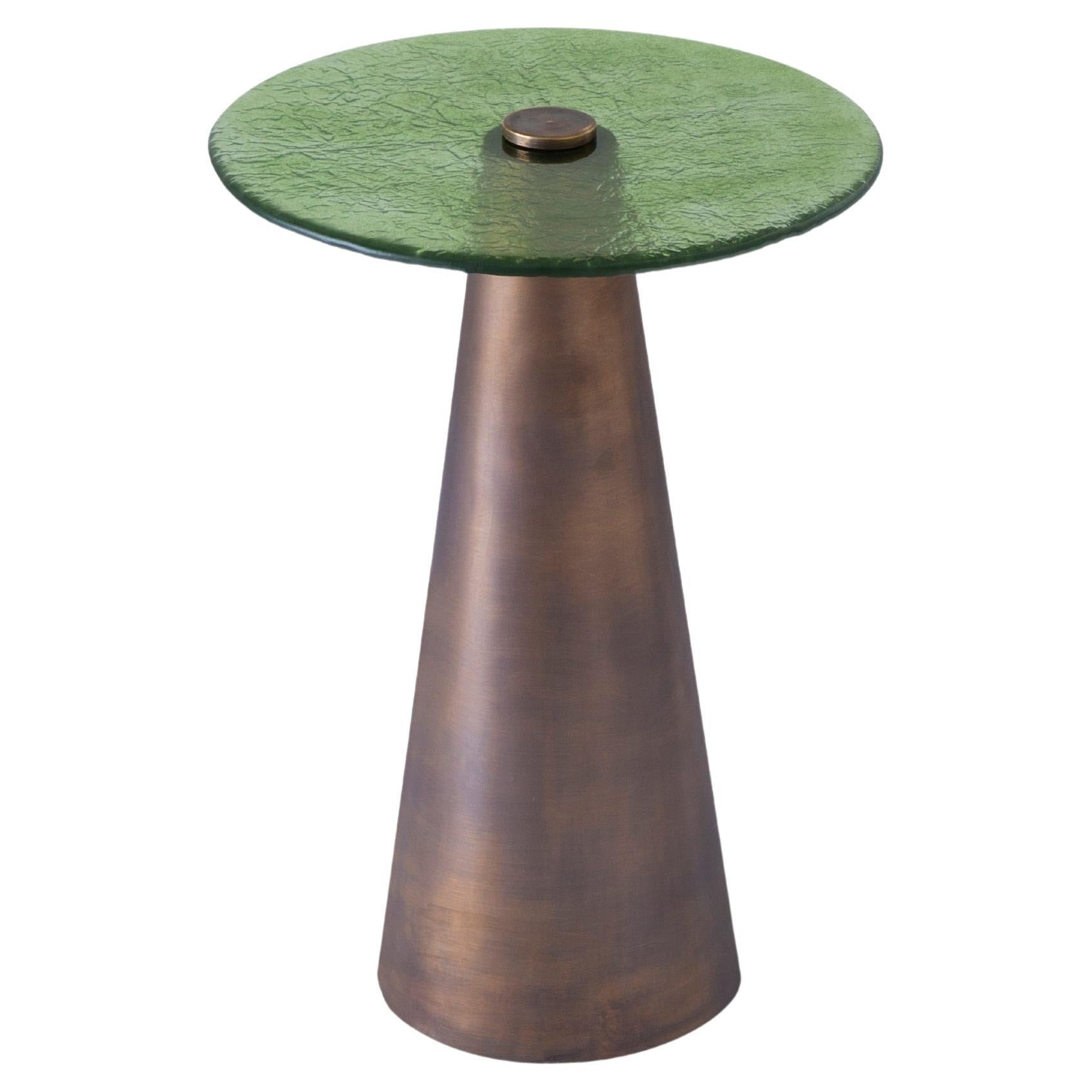 Blue & Green Set of Accent Tables with Hand-Blown Glass Mounted on Brass Cones. 
Fun, elegant and versatile. This duo made of brass base and hand-blown craft glass are a joy to look at. The turquoise – apple green mix is an all time classic, but