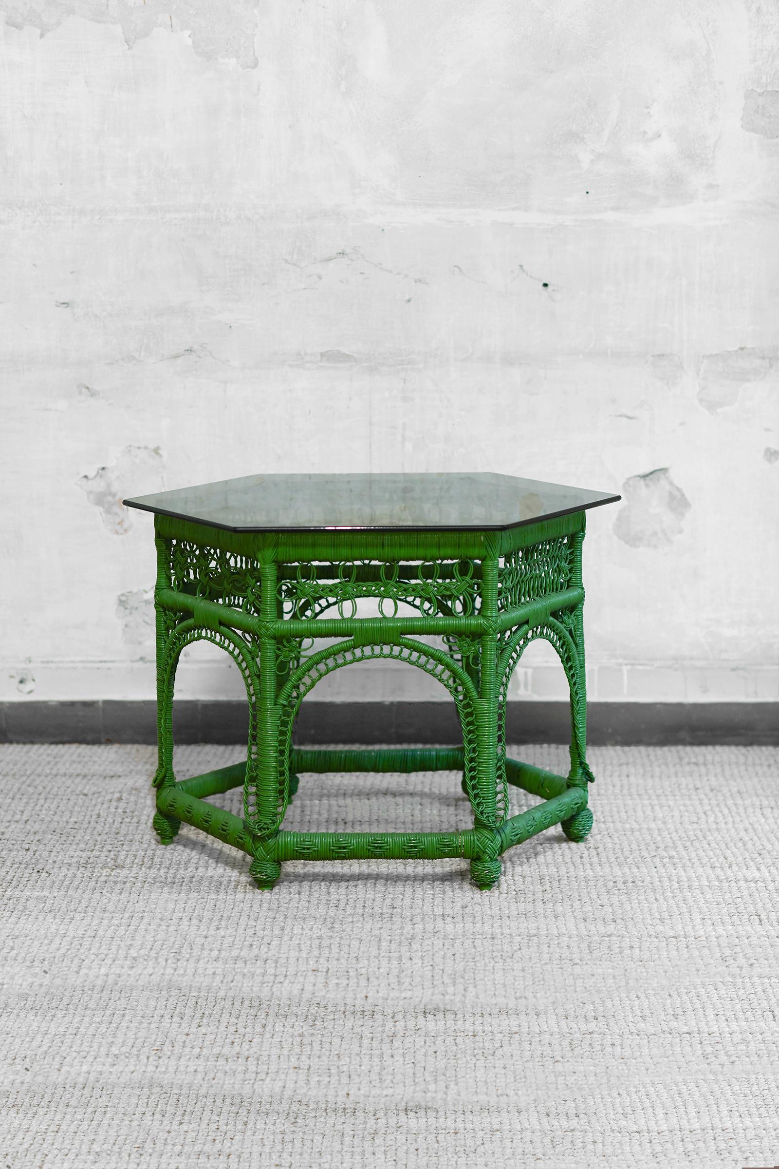 Green handwoven rattan coffee table, 1970s
Product Details
Hexagonal coffee table with smoked glass top and green rattan frame.
Dimensions: 86 W × 60 H x 73 D cm