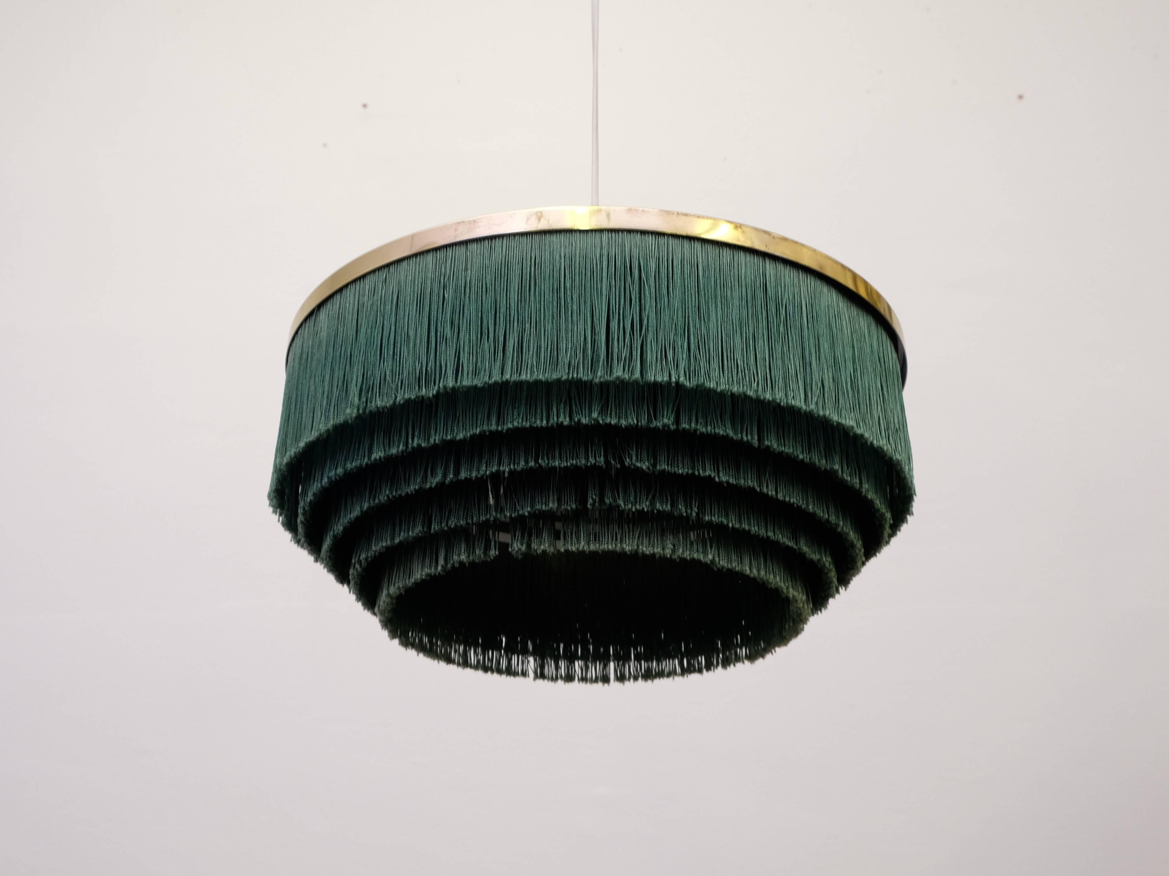 Set of 2 available. Hans-Agne Jakobsson forest green fringe pendant, 1960s.
Produced in Sweden by Hans-Agne Jakobsson AB in Markaryd, 1960s.

 