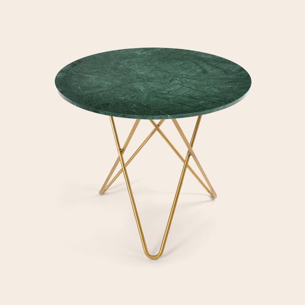 Green indio marble and brass dining O table by OxDenmarq
Dimensions: D 80 x H 72 cm
Materials: Brass, Green Indio Marble
Also Available: Different marble and frame options available.

OX DENMARQ is a Danish design brand aspiring to make