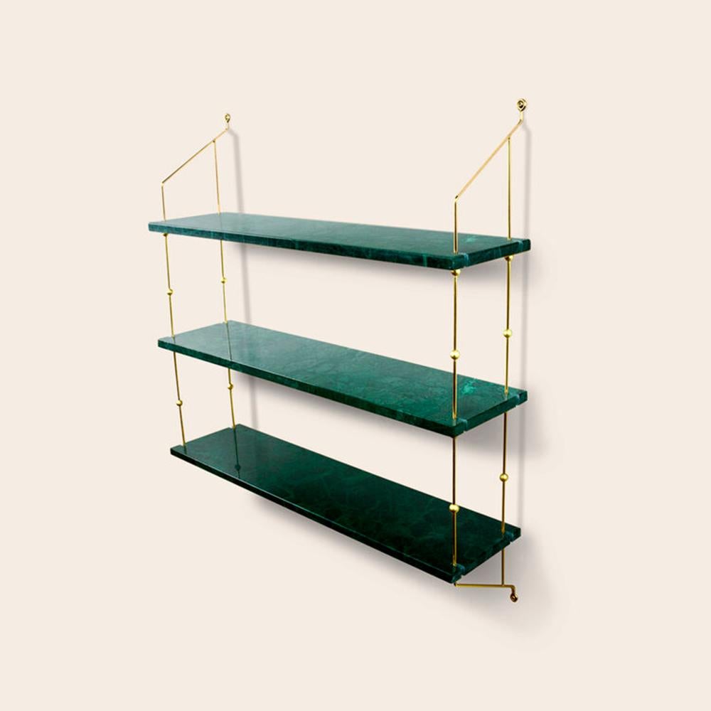 Green Indio marble and brass morse shelf by OxDenmarq
Dimensions: D 21 x W 80 x H 87 cm
Materials: brass, green indio marble
Also available: different marble and frame options available.

Ox Denmarq is a Danish design brand aspiring to make