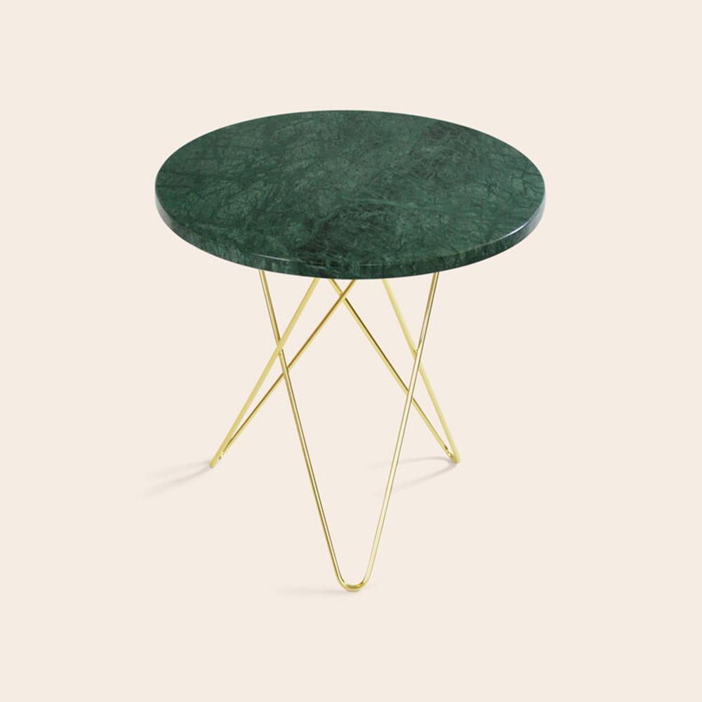 Green Indio Marble and Brass Tall Mini O Table by OxDenmarq
Dimensions: D 50 x H 50 cm
Materials: Brass, Green Indio Marble
Also Available: Different top and frame options available,

OX DENMARQ is a Danish design brand aspiring to make