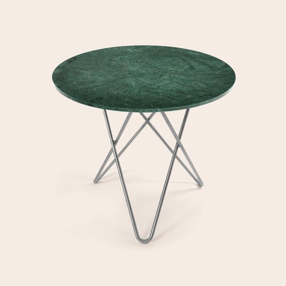 Green Indio marble and stainless steel large dining o table by OxDenmarq
Dimensions: D 100 x H 72 cm
Materials: Steel, Green Indio Marble
Also Available: Different marble and frame options available.

OX DENMARQ is a Danish design brand