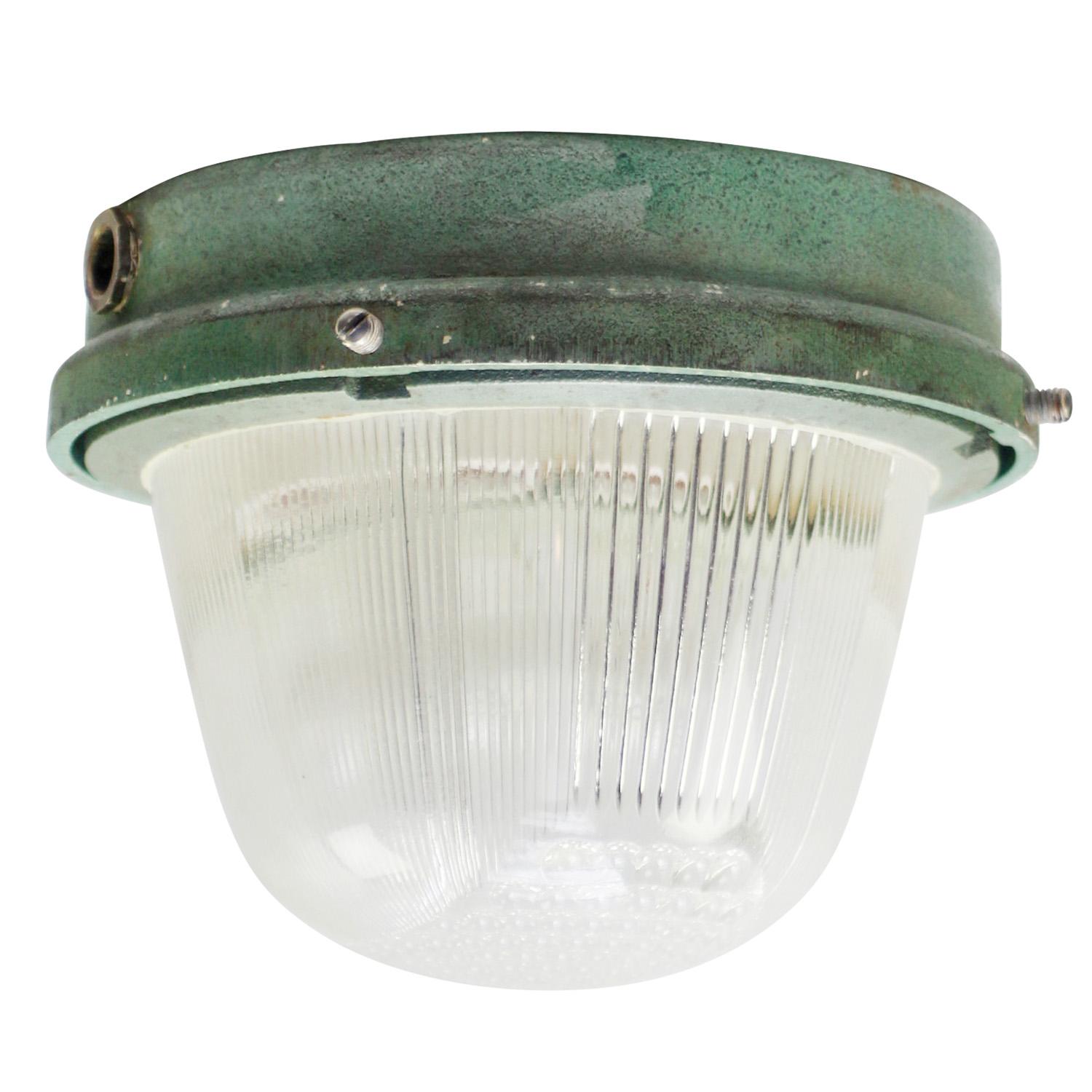 French Industrial wall / ceiling lamp by Holophane, France, model CE100
Green cast iron with clear cut glass.

Weight : 4.10 kg / 9 lb

Priced per individual item. All lamps have been made suitable by international standards for incandescent light