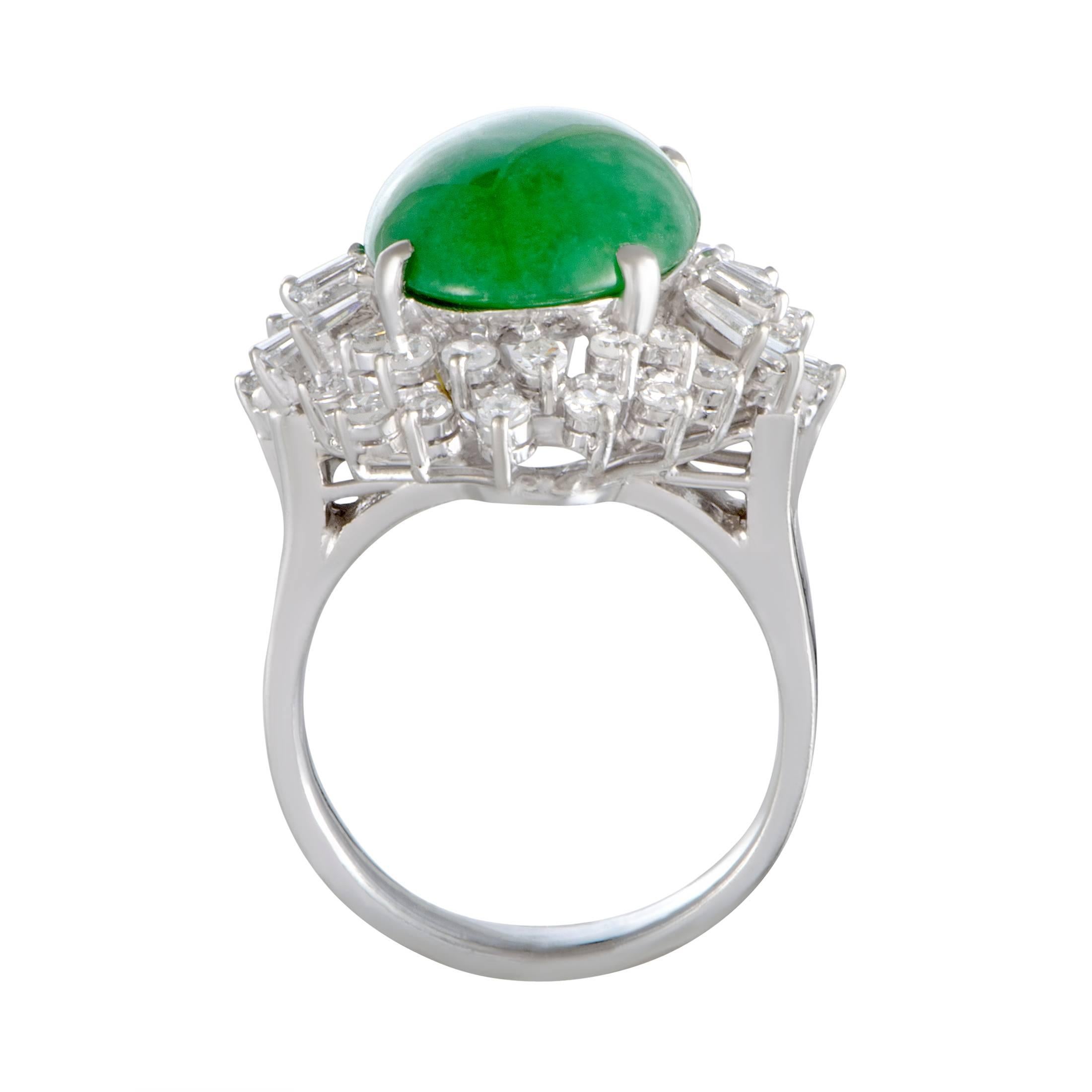 Set amidst a plethora of diversely cut diamond stones, the eye-catching green jade lends its compelling allure to this spectacular ring. The ring is crafted from luxurious platinum and it boasts a total of 0.85 carats of diamonds.
Ring Top