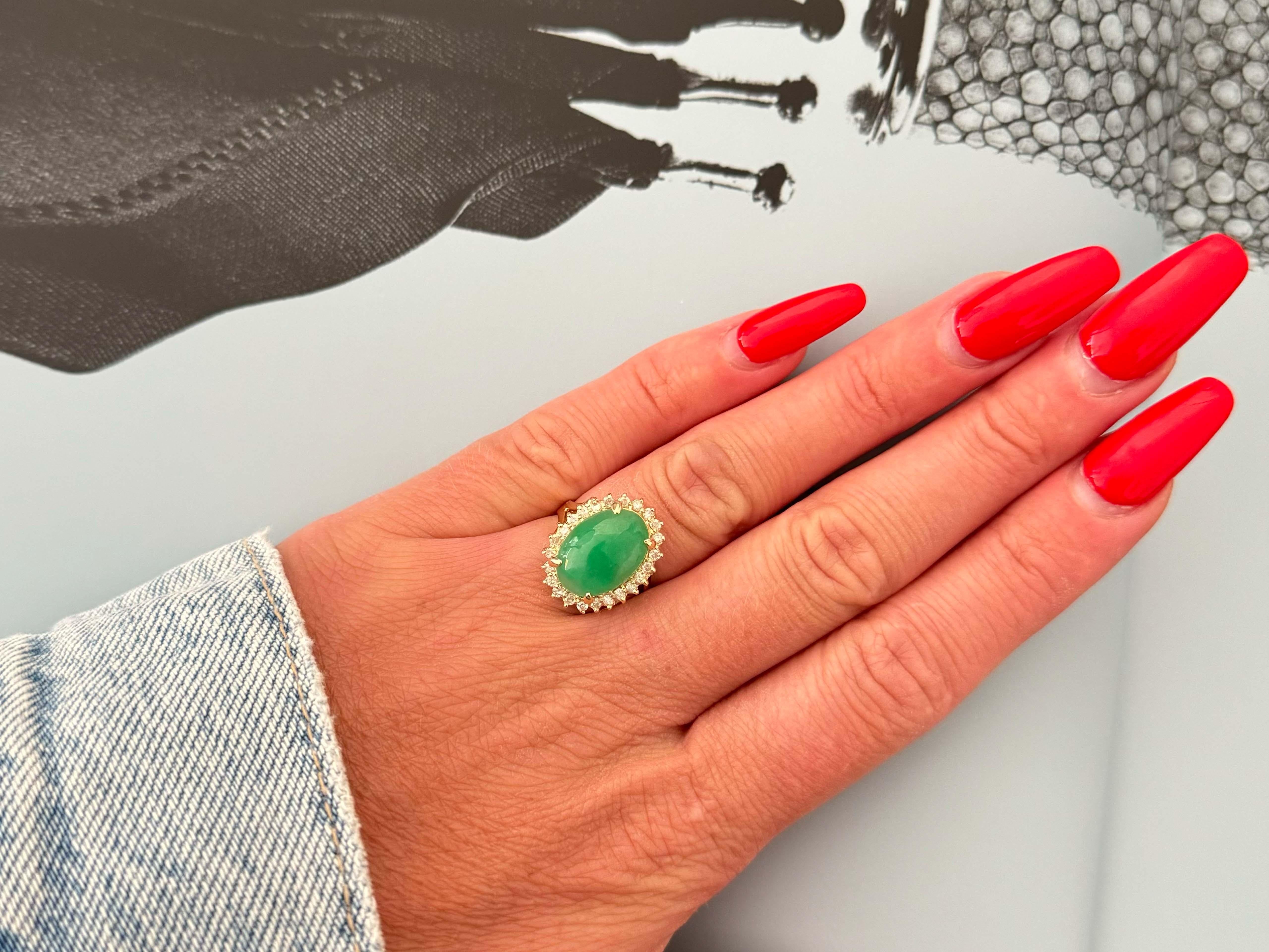 Ring Specifications:

Metal: 14k Yellow Gold

Total Weight: 3.9 Grams

Diamond Count: 24
​
​Diamond Carat Weight: 0.25 carats
​
​Diamond Color: I-K
​
​​Diamond Clarity: I1-I2

Jade Carat Weight: ~5 carats

Jade Measurements: 14 mm x 10.1 mm x 3.8