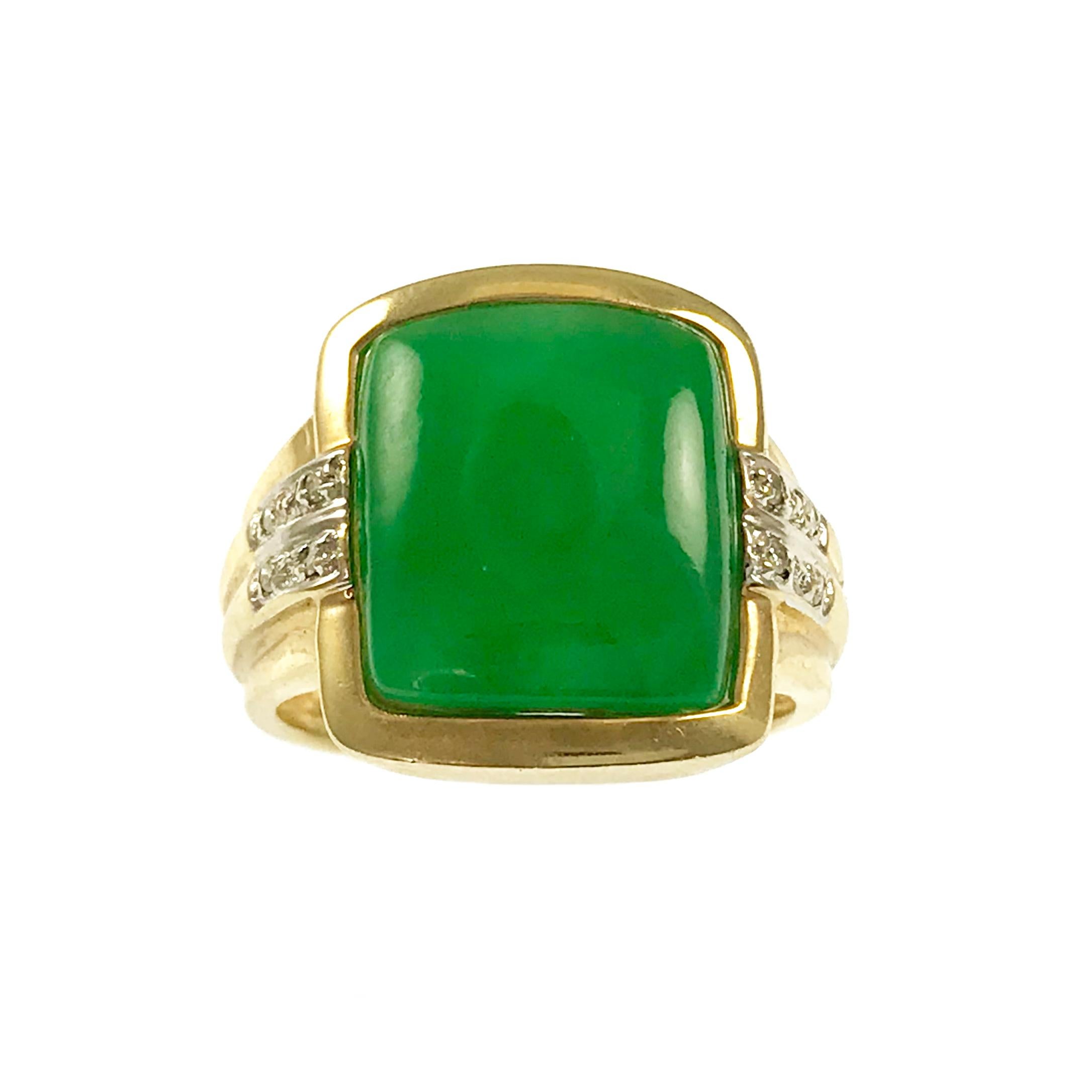 14 Karat Green Jade Diamond Ring. Elegant retro-style Jade ring with Melee side diamonds set in 14 Karat white gold. The ring is size 7 1/4 and the total weight of the ring is 7.5 grams.