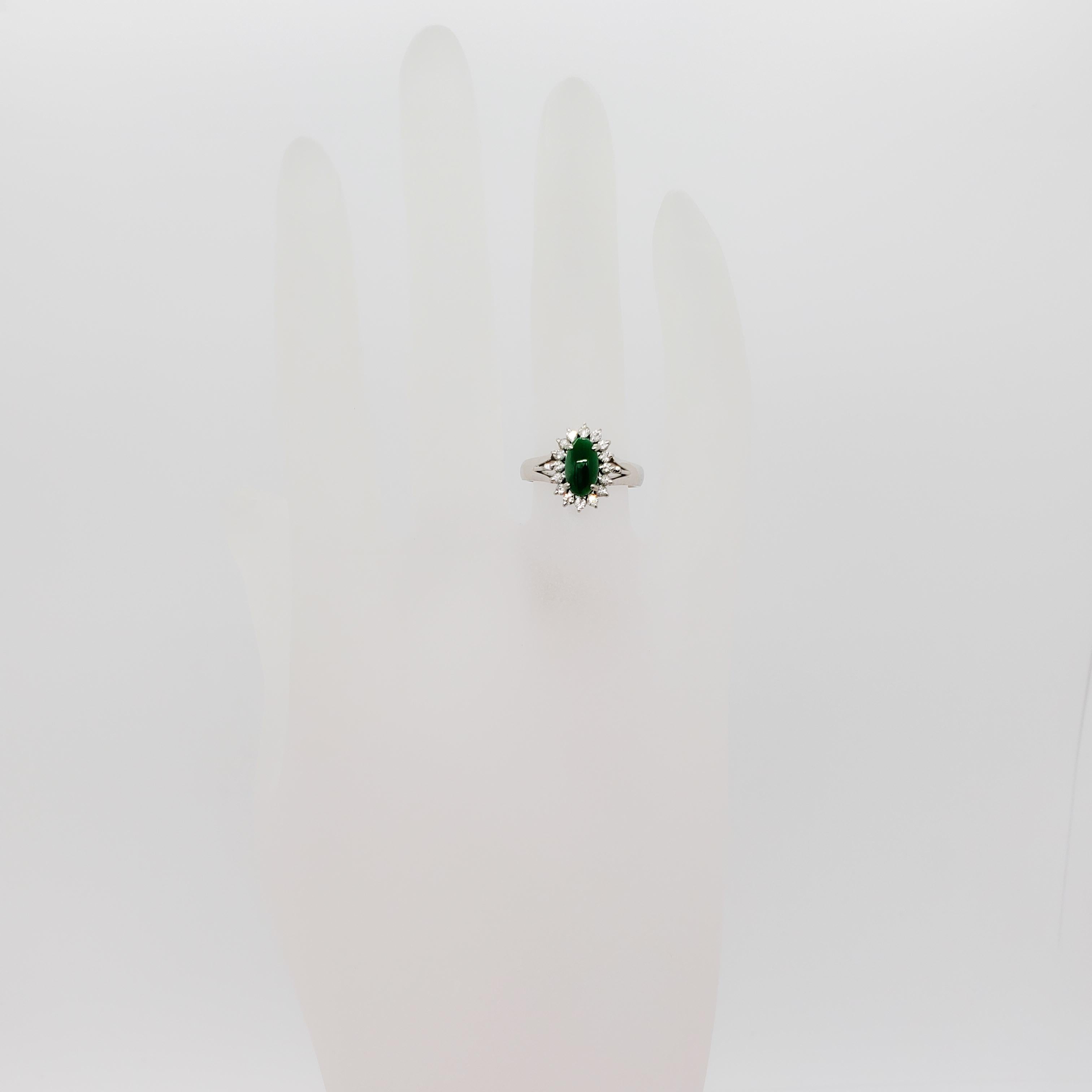 Oval Cut Green Jade Oval Cabochon and White Diamond Cluster Ring in Platinum
