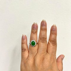 Green Jade Oval Cabochon and White Diamond Ring in Platinum