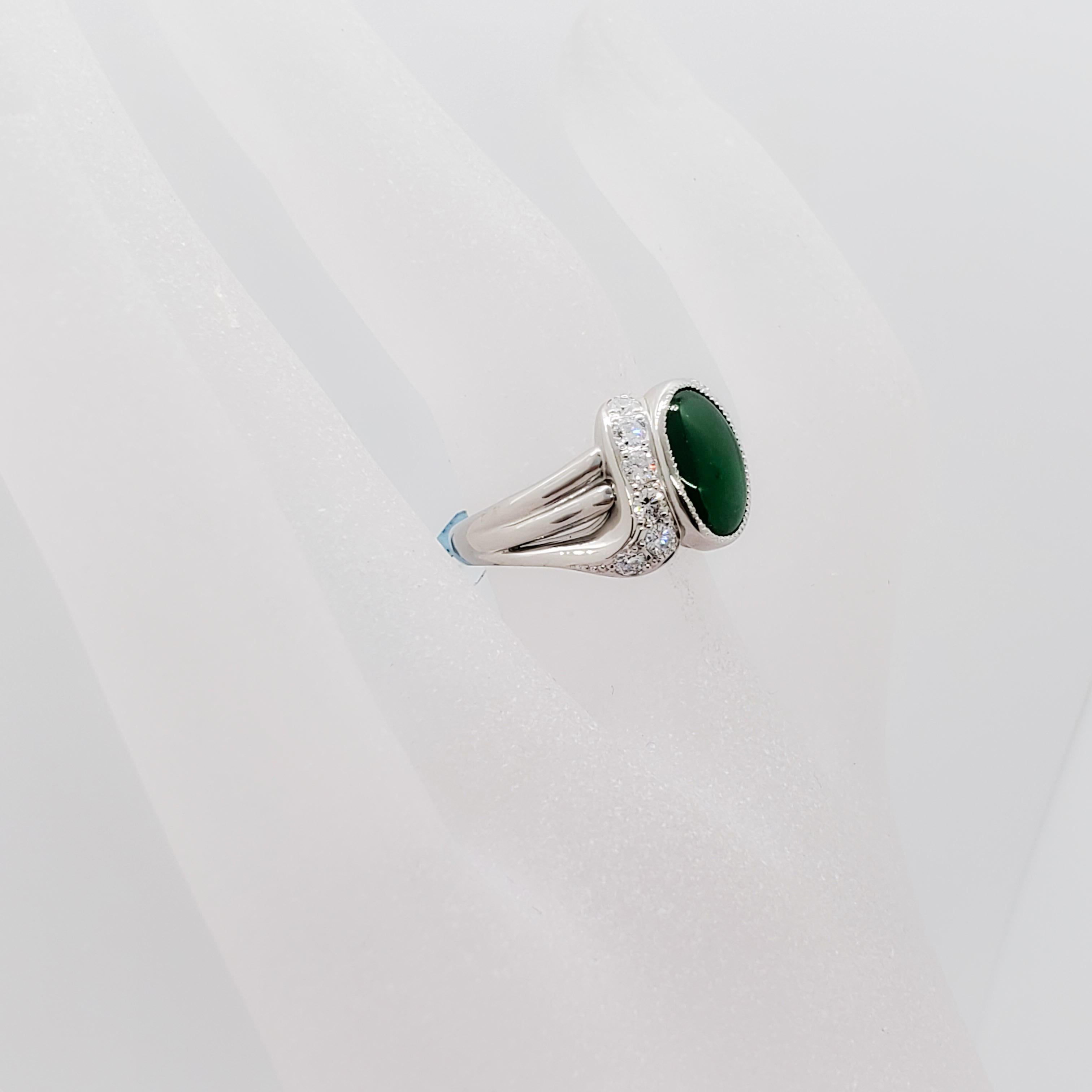 Oval Cut Green Jade Oval Cabochon and White Diamond Round Cocktail Ring in Platinum