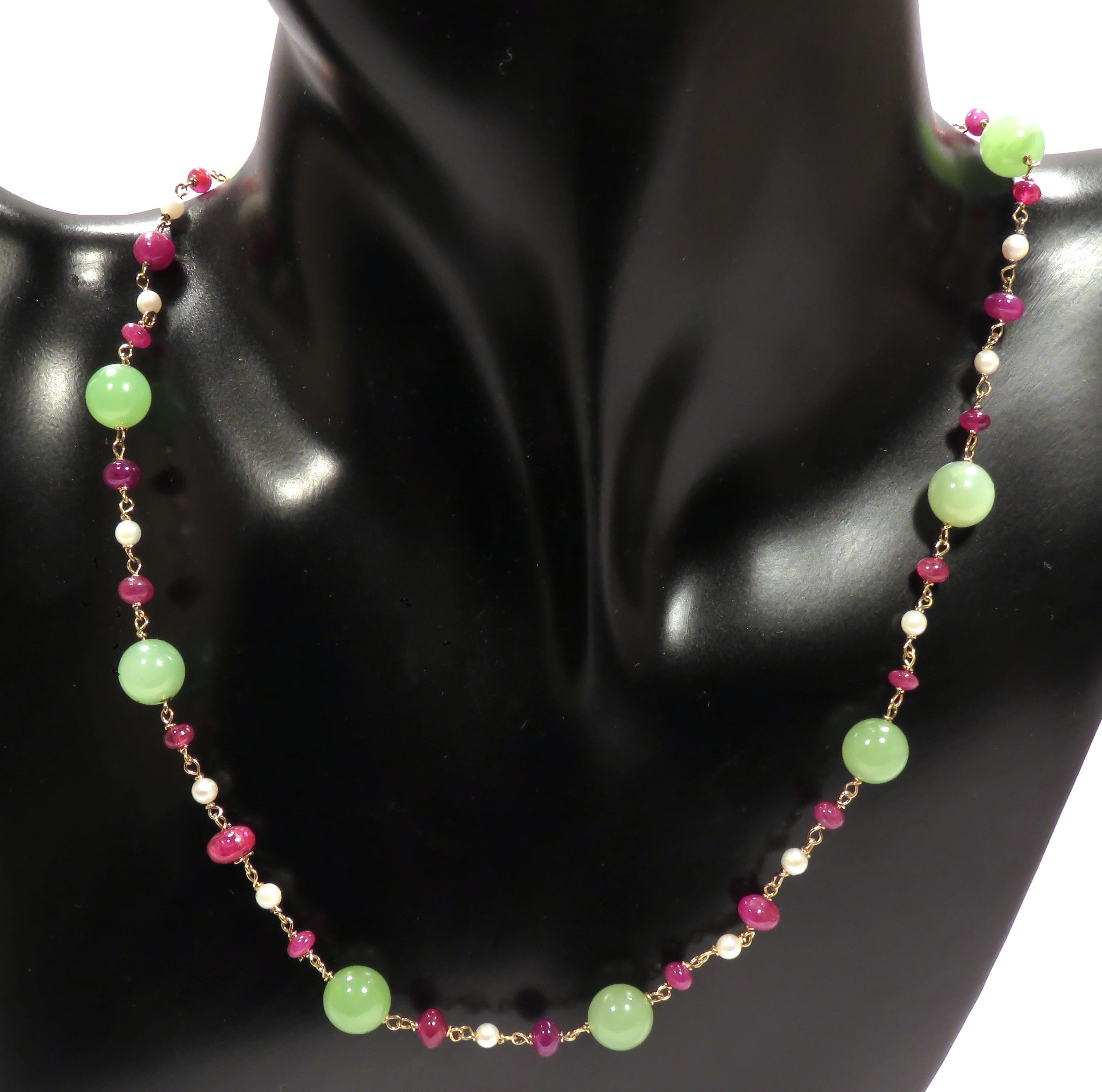 Attractive choker necklace crafted in 9 karat rose gold with green jade, white freshwater pearls and rubies. The length of the necklace is adjustable from 390 mm to 420 mm / from 15.354 inches to 16.535 inches, it is possible to lengthen the choker