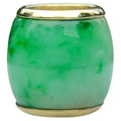 Green Jadeite Barrel Slide Pendant in 14 Karat Gold. 1960s.