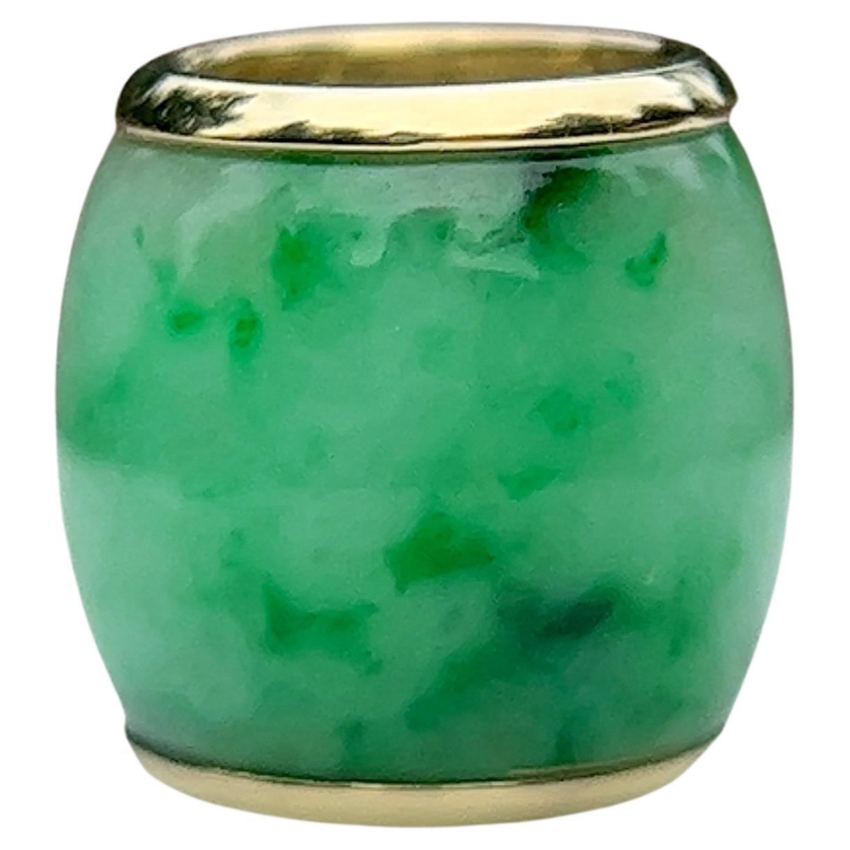 Green Jadeite Barrel Slide Pendant in 14 Karat Gold. 1960s.