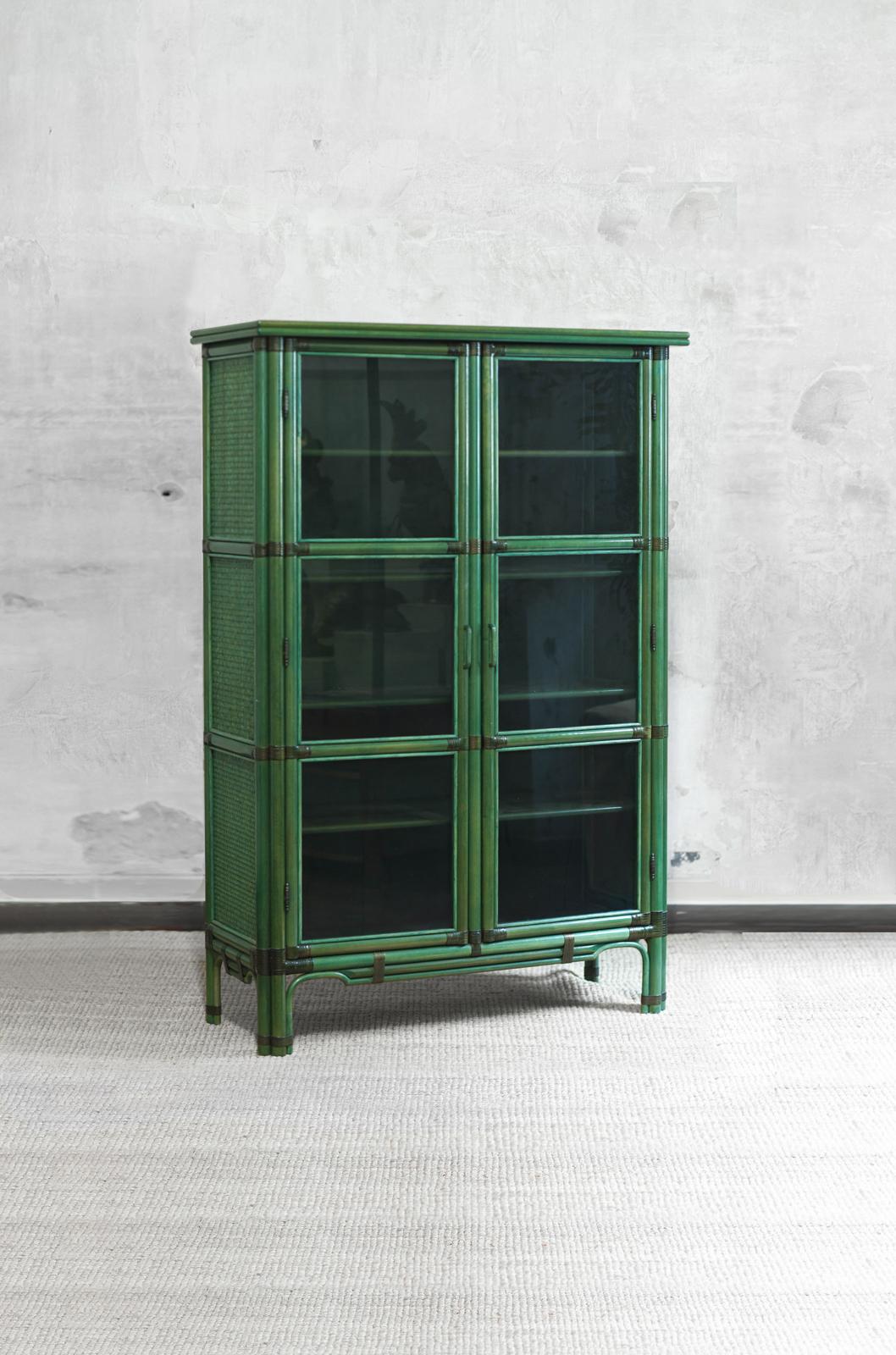 Green lacquered living room display cabinet, 1980s 
Product Details
Display cabinet made of wood, bamboo, and rattan fabric with leather bindings and internal shelves.
Dimensions: 110 W x 175 H x 46 D cm