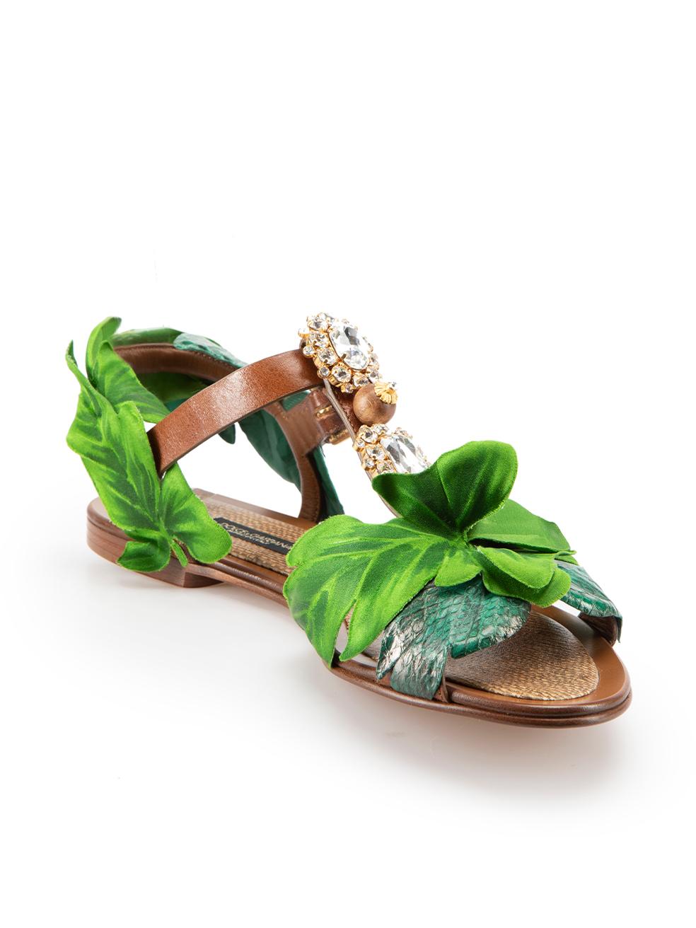 CONDITION is Never Worn. No visible wear to sandals is evident on this used Dolce & Gabbana designer resale item. These shoes come with original box.



Details


Brown

Leather

Sandals

Green leaves detail

Crystal embellished

Adjustable ankle