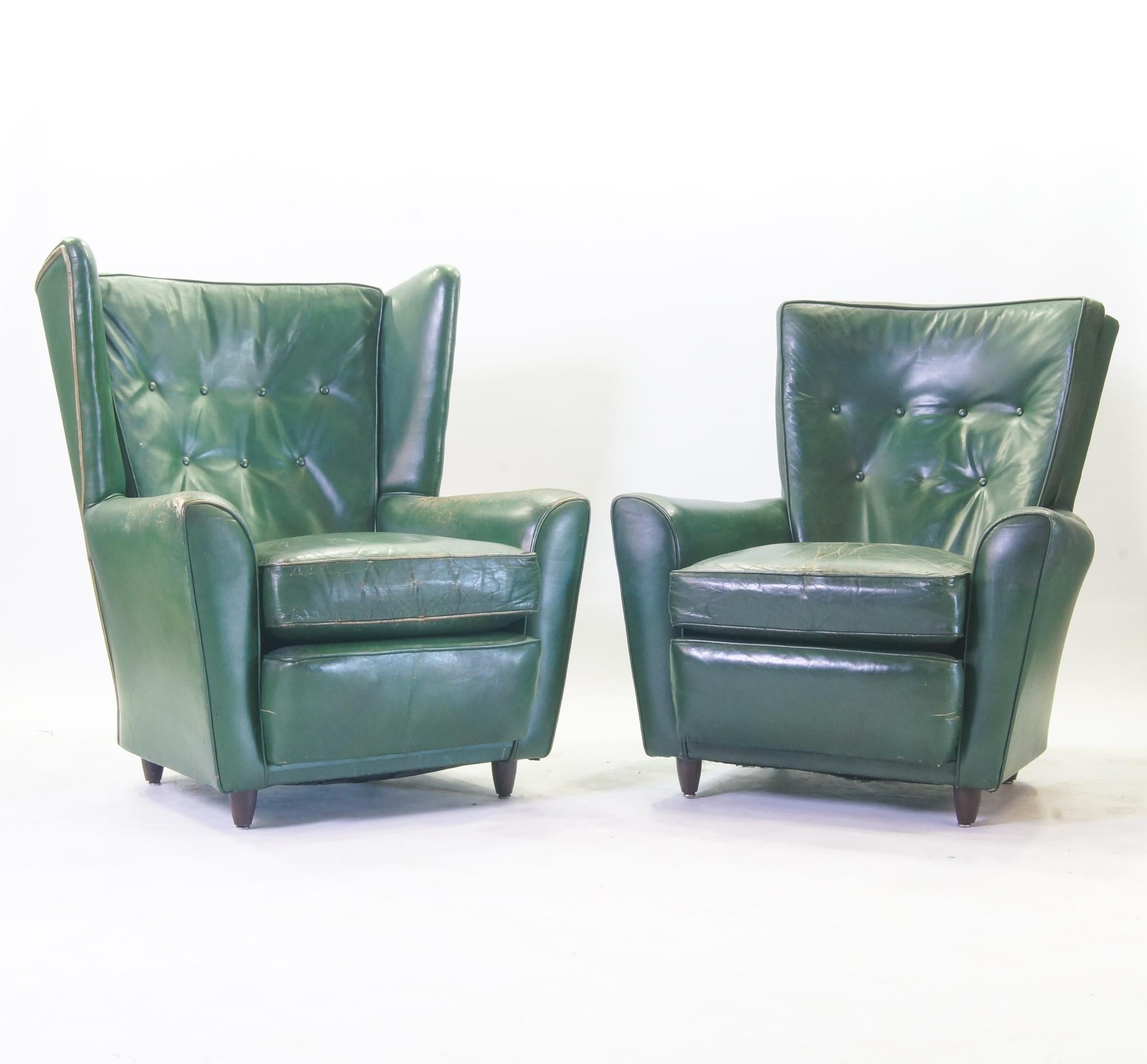 Green leather Raw club chairs - set of 2

Denmark, 1940's
Authentic green leather chairs. With characteristic patine wich makes this fauteuill ideal for the gastronomy branch or in front of your library. Patine all over, so in good vintage- and