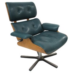 Lounge-Sessel aus grünem Leder im Eames-Stil