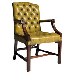 Green leather upholstered office chair