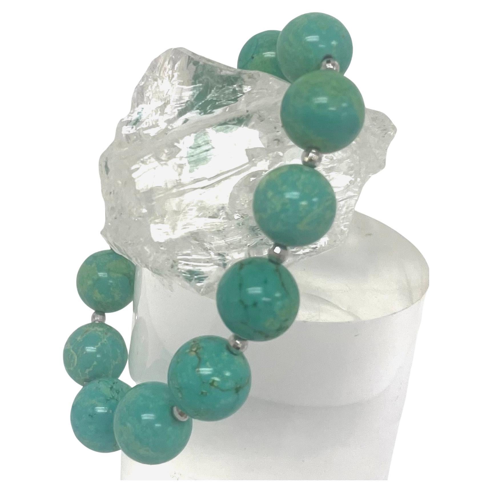 Description
Luscious green magnesite enhanced stretchy bracelet with 14k white gold faceted beads. Great for stacking. 
Item # B1275
Stack  it with item# B1269. (Sold separately).

Materials and Weight 
Green magnesite, 155cts, 13 pieces 12mm round