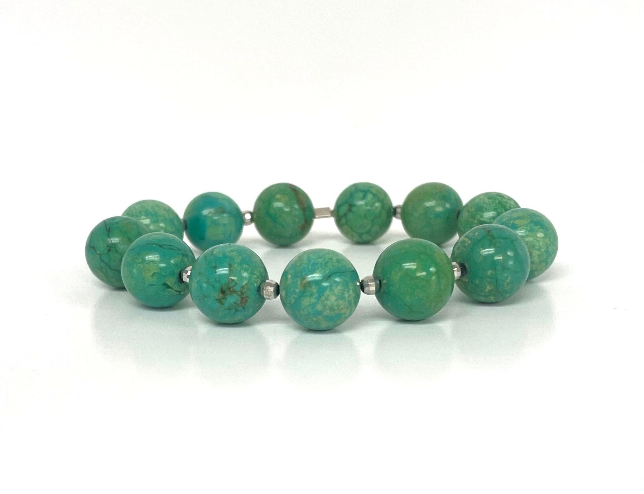 Description
Luscious green magnesite stretchy bracelet enhanced with 14k white gold faceted beads. Great for stacking.
Item # B1269 
Stack it with item# B1269. Sold separately.

Materials and Weight 
Green magnesite, 155cts, 13 pieces 12mm round