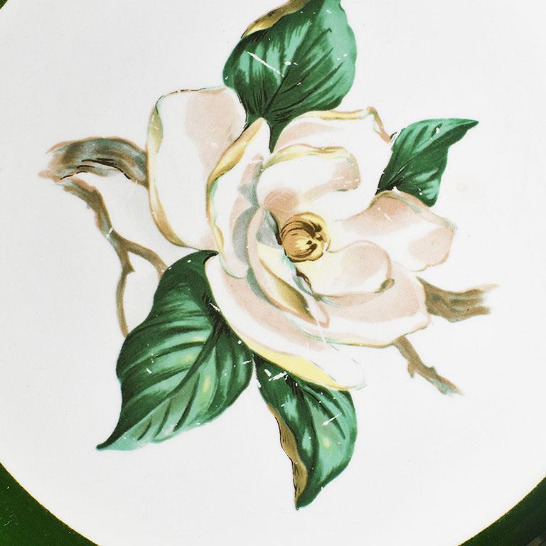 A pretty vintage green dinner plate with a white magnolia flower at the center. 

Back reads in green: 
Nautilus 
Made in U.S.A. 
A54N5

Reads at Back in Gold:
Lifetime China Co.
Semi-Vitreous
Alliance Ohio
Jaderose

Dimensions:
10.25