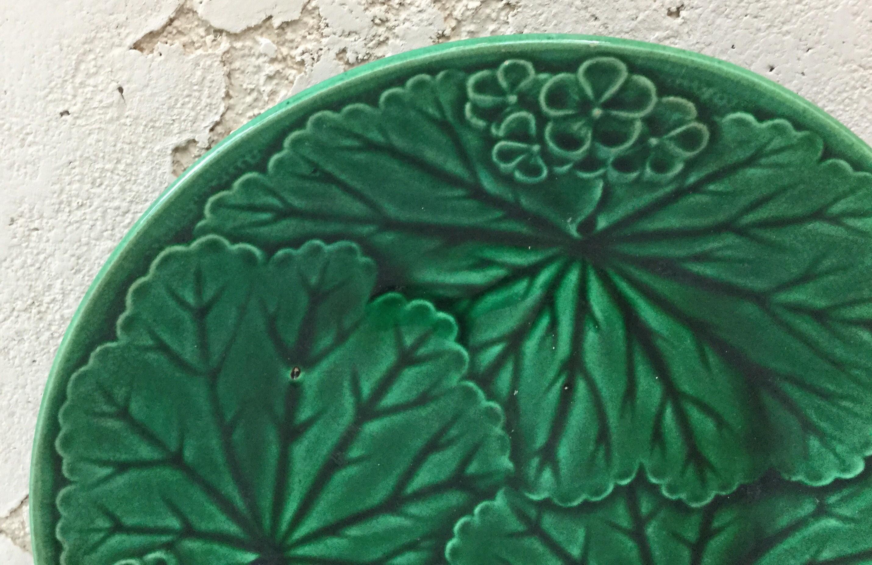 Green Majolica plate signed Clairefontaine, circa 1890.
 