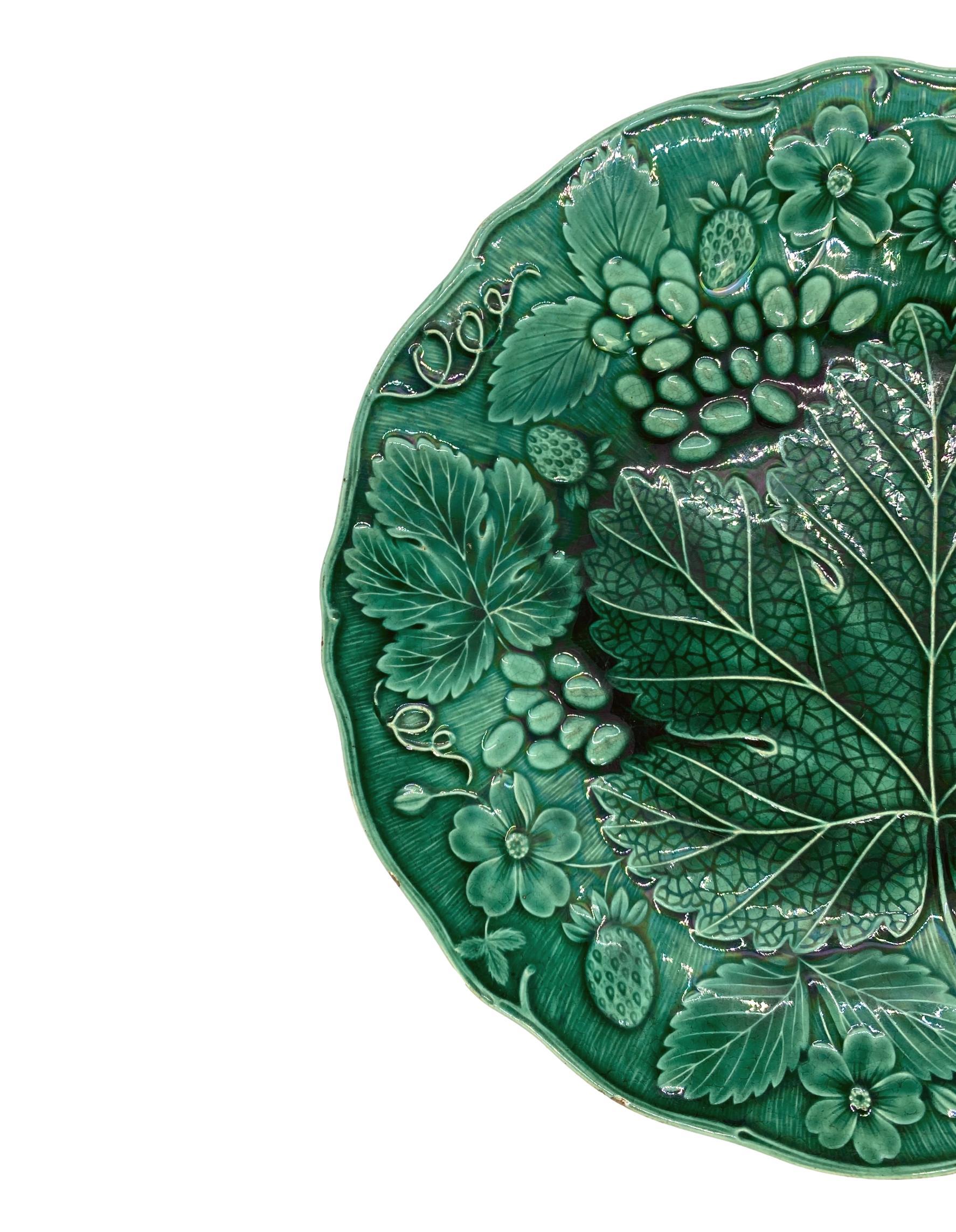 Green Majolica strawberry dessert plate, English, molded with strawberries and grapes, English, ca. 1880.