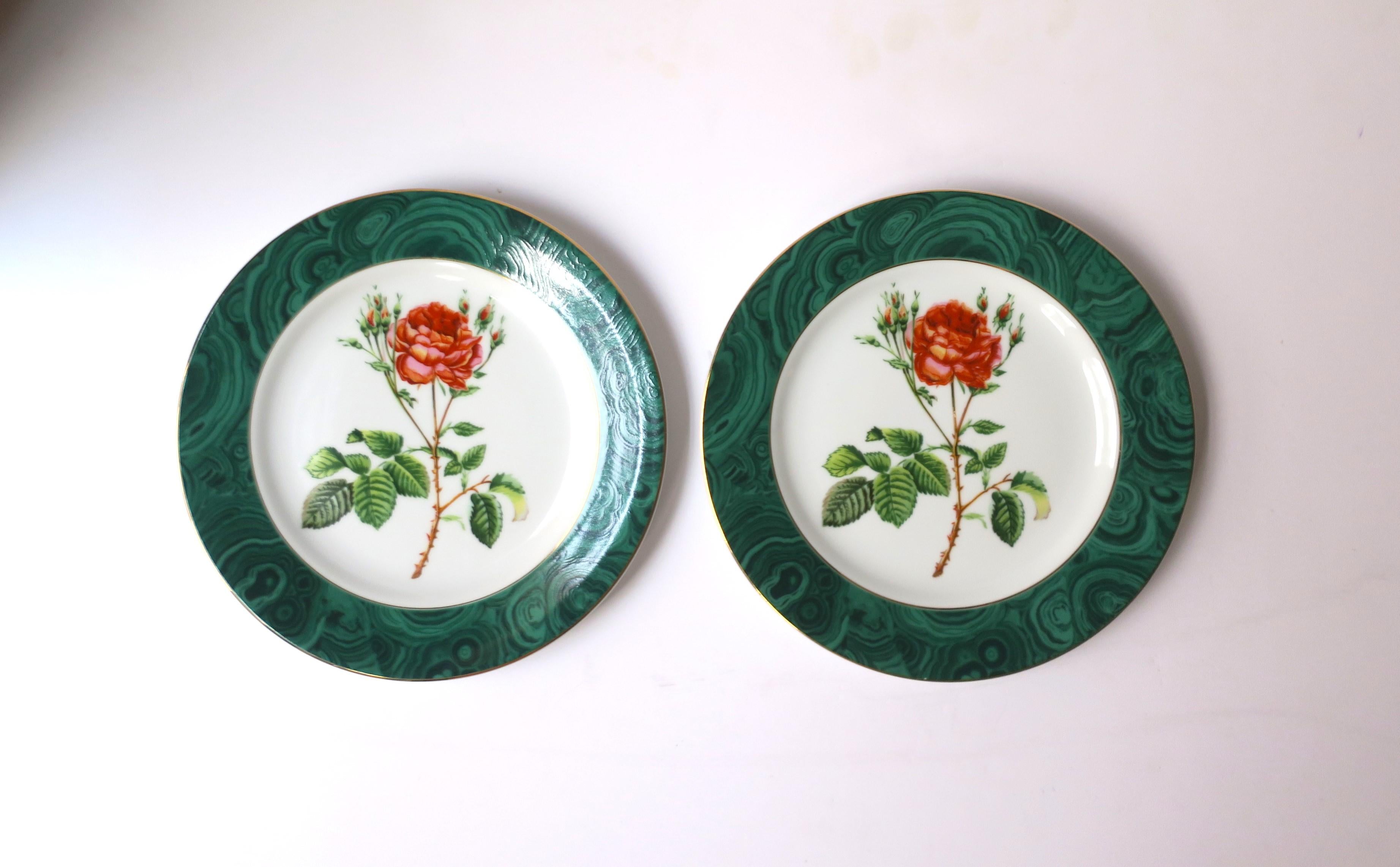 A beautiful pair of porcelain plates with green malachite style edge and chintz rose flower center by designer Georges Briard, circa late-20th century. A great set to use every day or for special occasions/entertaining to hold small items like