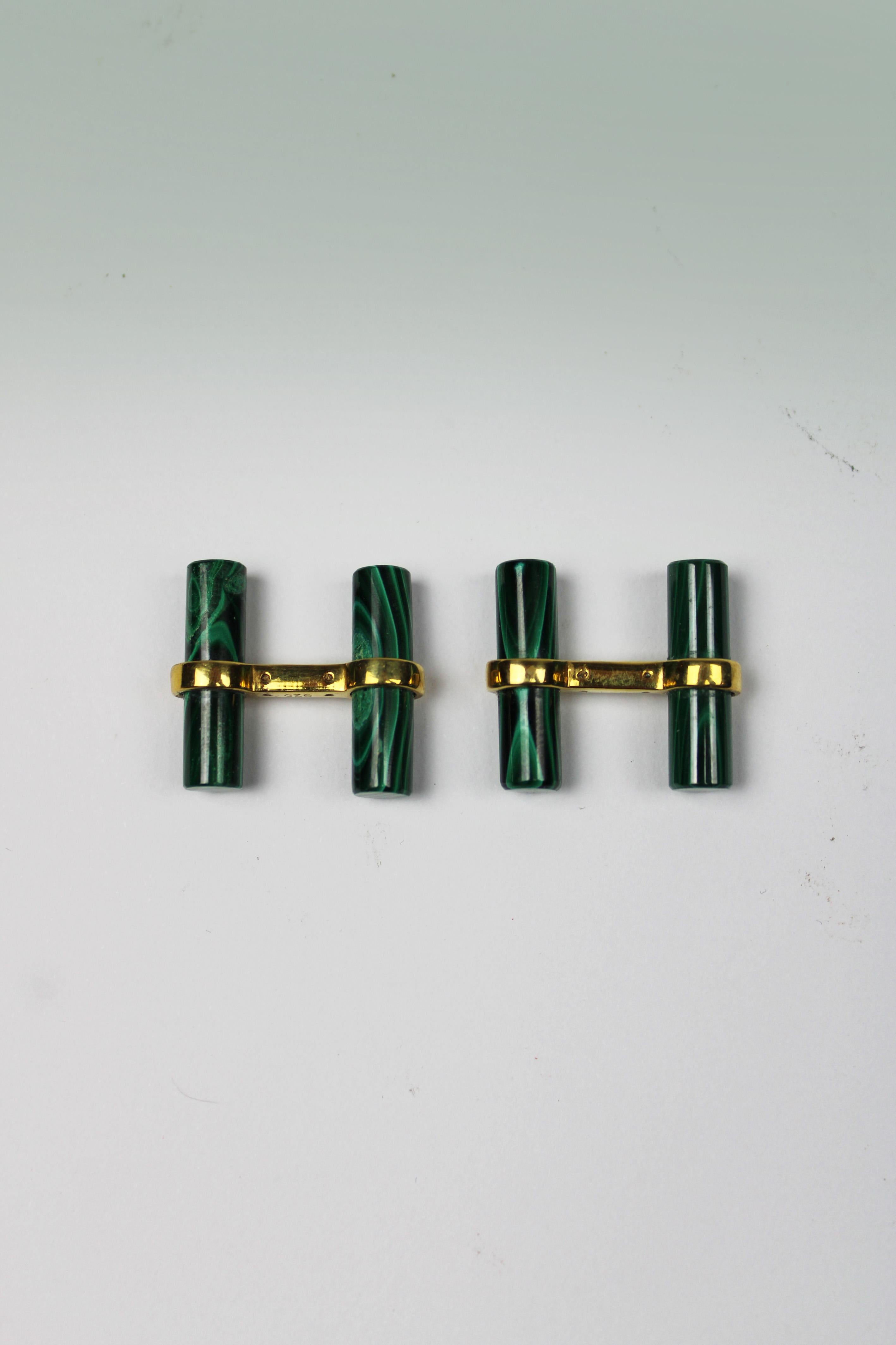 Elevate your style with these luxurious Green Malachite Cufflinks, meticulously crafted in 22.5 Karat Yellow Gold, straight from the fashion houses of 1980s France. Each cufflink boasts a mesmerizing green malachite gemstone, radiating elegance and