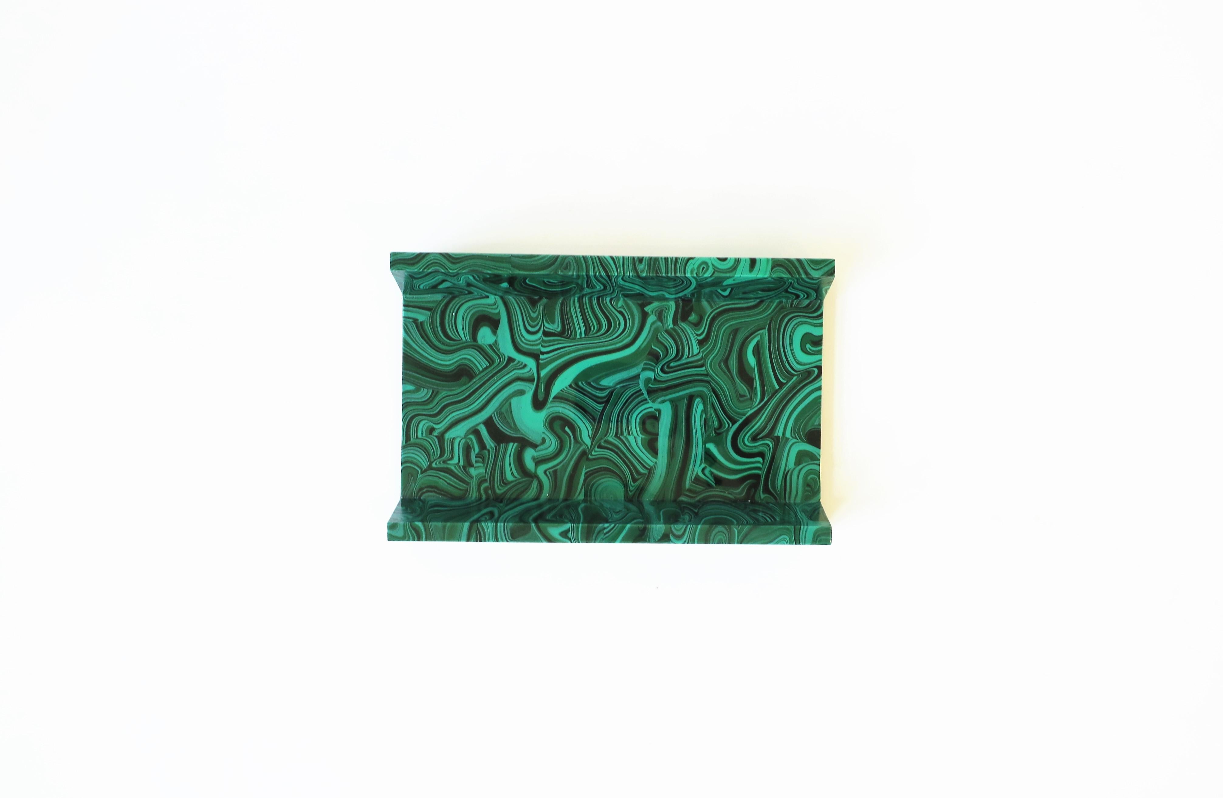 A striking green malachite style resin paper napkin or hand-towel holder, circa Late-20th century. A convenient piece for a vanity/bathroom area, etc. Piece measures: 5.25