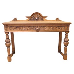 Table de hall en chêne doré sculpté par l'homme vert  La table est fabriquée en Oak Solid.