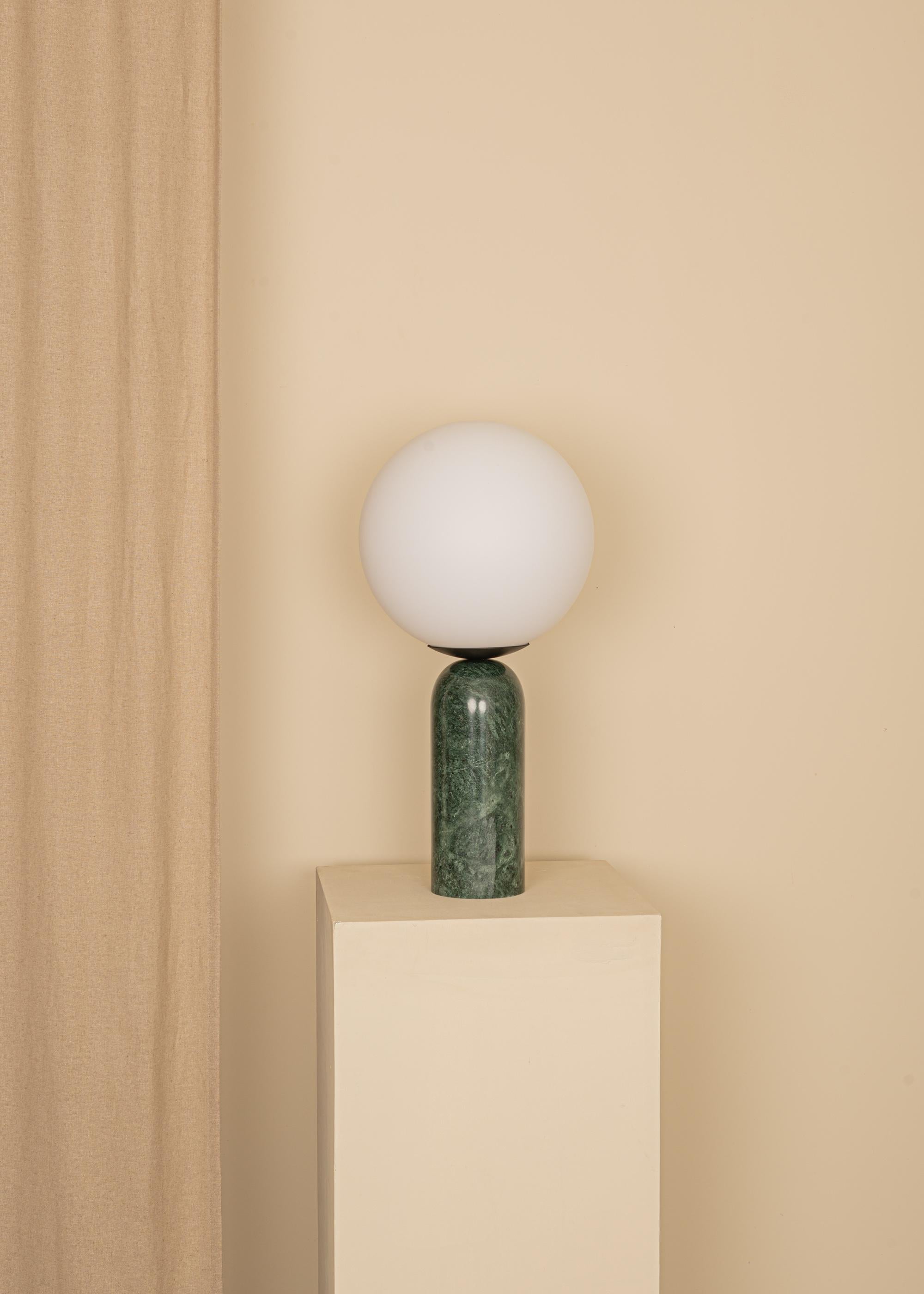 Green Marble and Steel Atlas Table Lamp by Simone & Marcel
Dimensions: Ø 30 x H 60 cm.
Materials: Glass, steel and green marble.

Also available in different marble, wood and alabaster options and finishes. Custom options available on request.