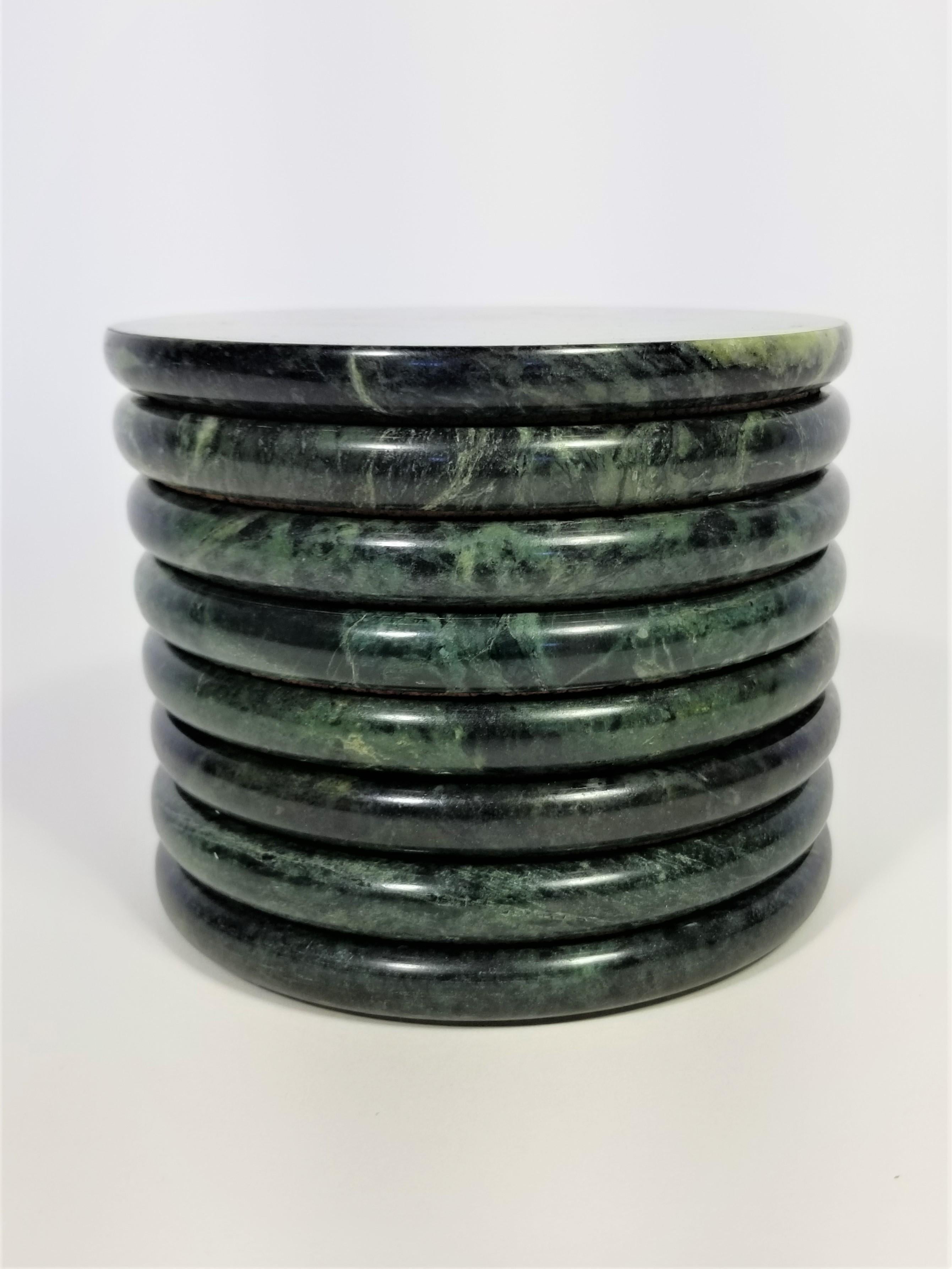 Gorgeous set of 8 vintage midcentury green marble coasters. Cork protective bottom. Marble is in excellent condition and cork bottoms exhibit minor wear consistent with age and use.
