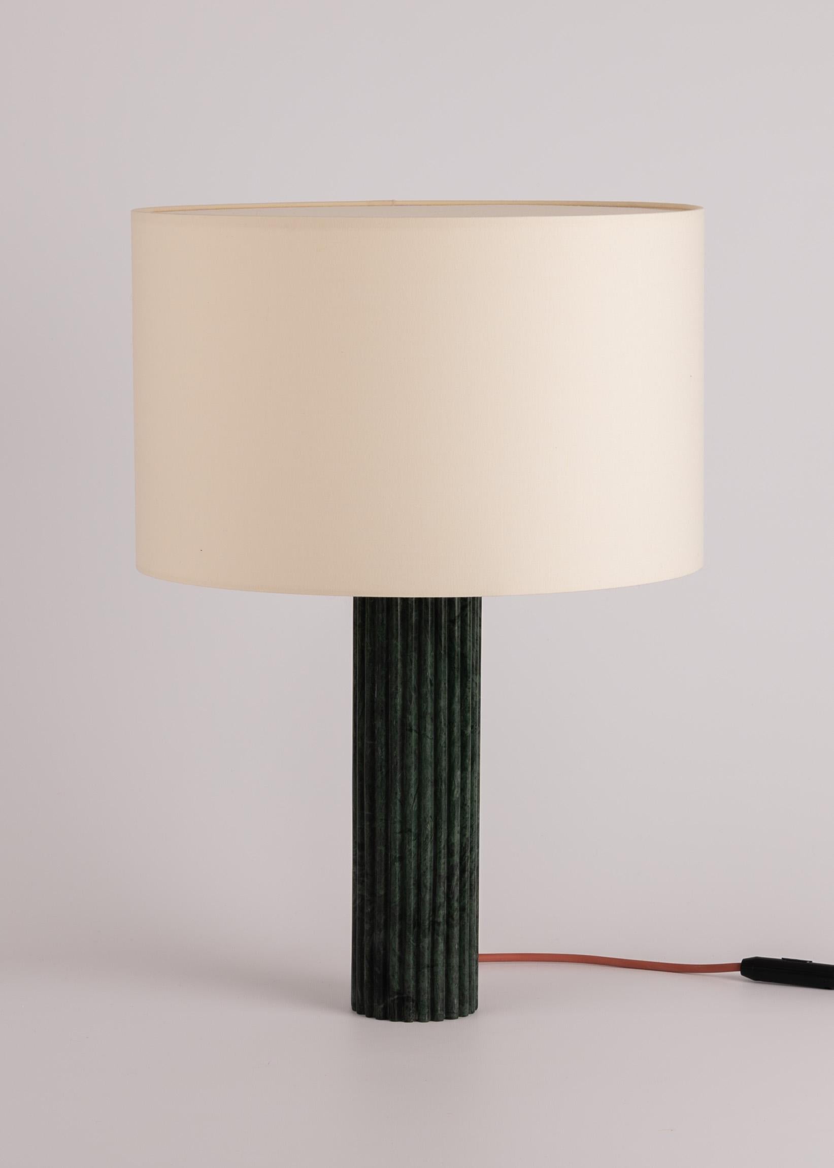 Green Marble Fluta Table Lamp by Simone & Marcel
Dimensions: Ø 40 x H 58 cm.
Materials: Cotton and green marble.

Also available in different marble and wood options and finishes. Custom options available on request. Please contact us. 

All our