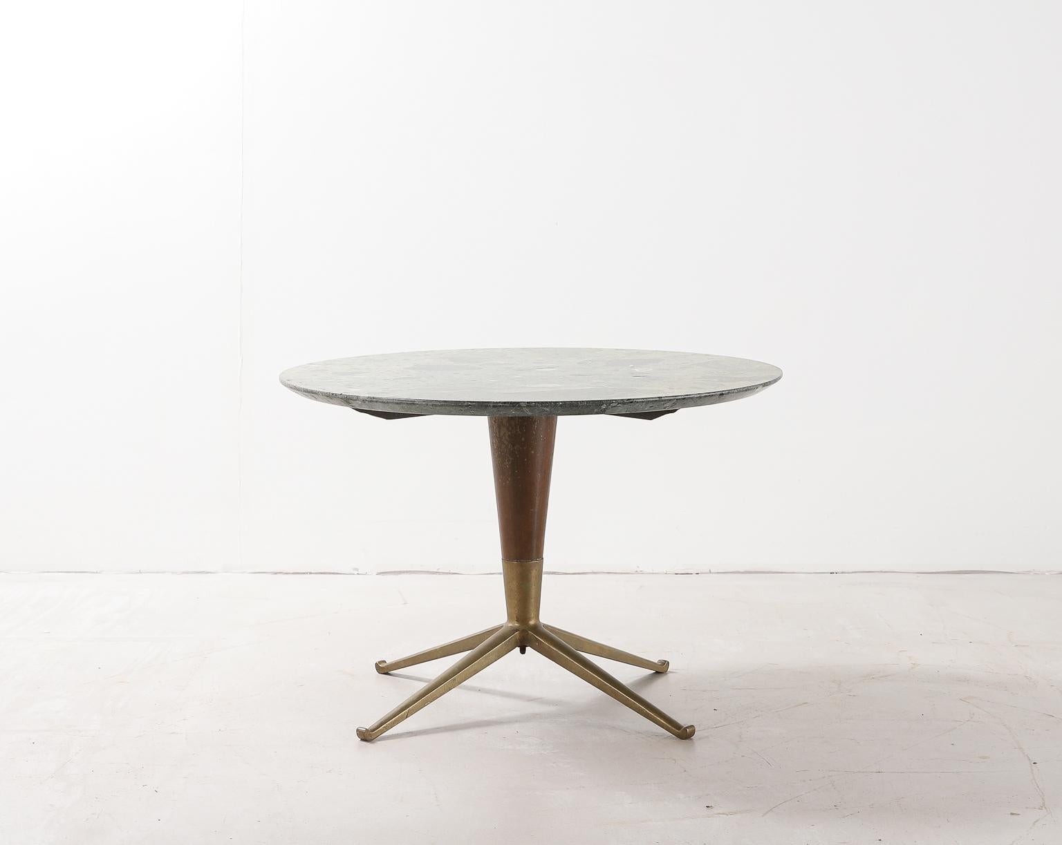1950s Italian pedestal table. Green marble tabletop, brass feet and wood stem attributed to Melchiorre Bega.