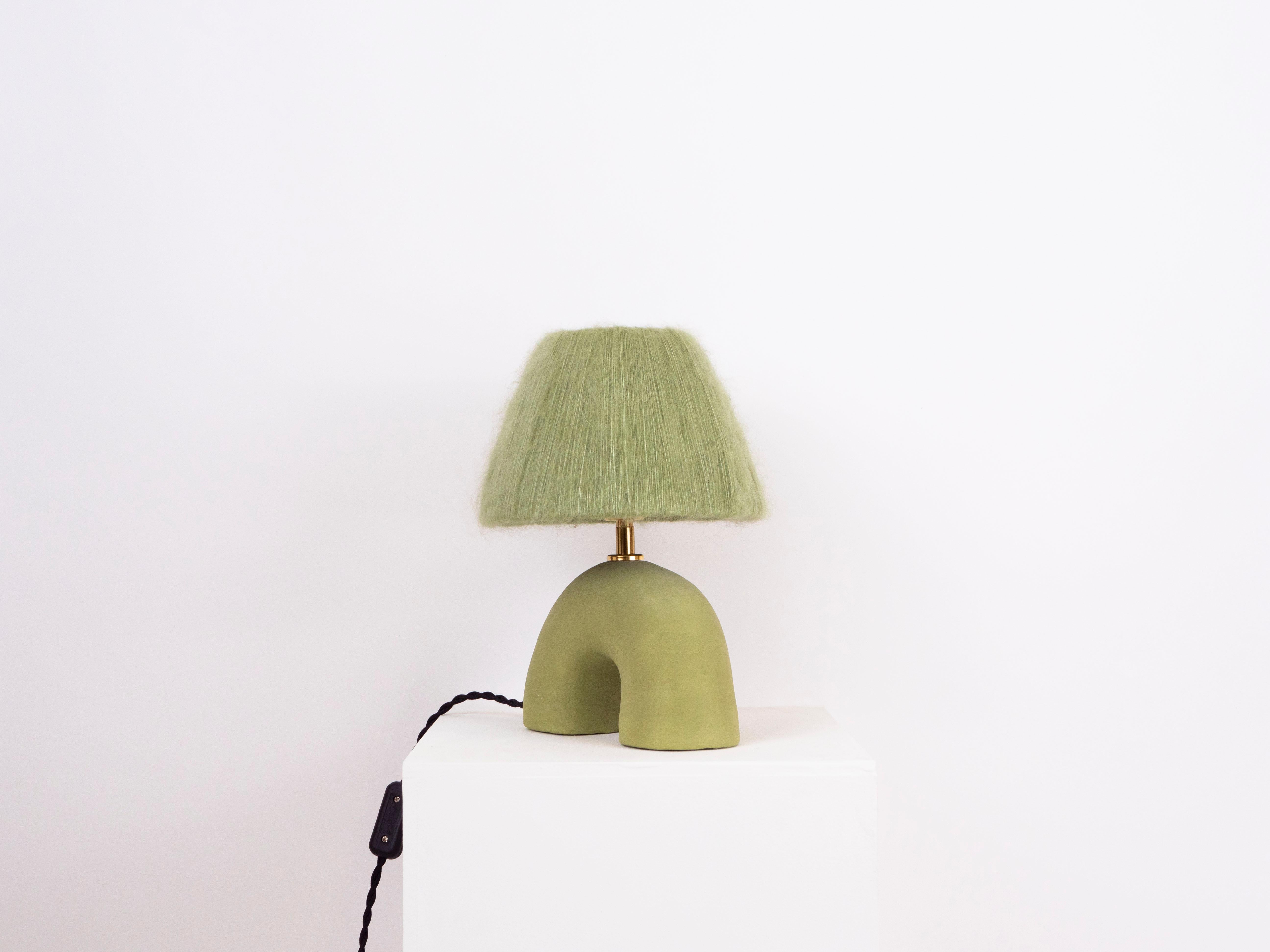 Green matte finish lamp with mohair shade

Estimated processing time is 2 weeks from order confirmation

Pictured with a Mini Globe LED E27 Bulb. Bulb not included

To pair this base with a shade in an alternative colour or Material, click the