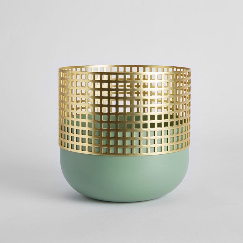 Green medium vase by Mason Editions
Dimensions: 21 × 21 × 21.5 cm
Materials: Iron 
Colors: cotto, sage green, black 

The collection includes three objects with different shapes and functions. Mia’s decisive impression is given by the contrast